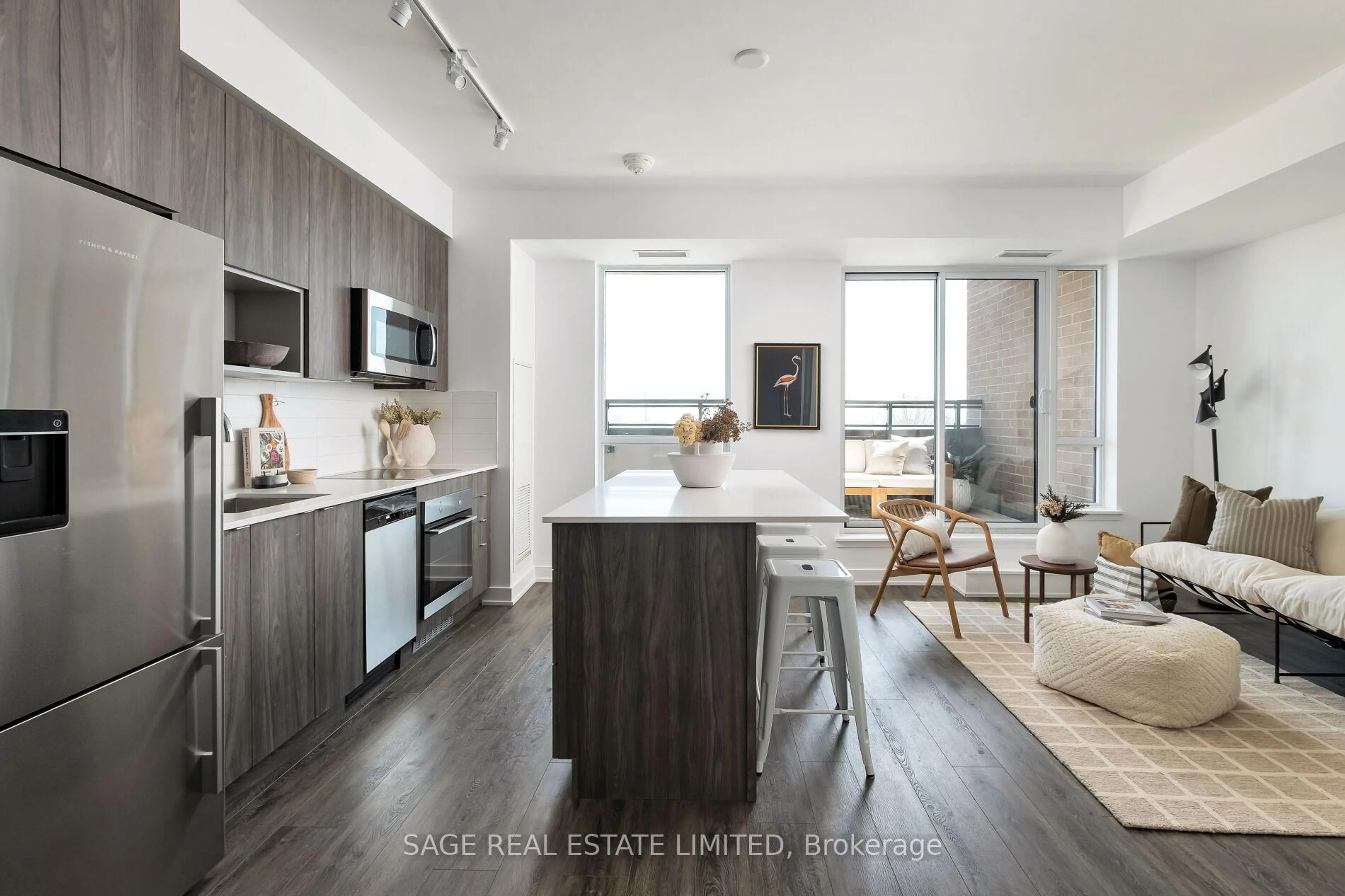 Open concept kitchen, wood/laminate floor for 630 Greenwood Ave #501, Toronto Ontario M4J 4B2