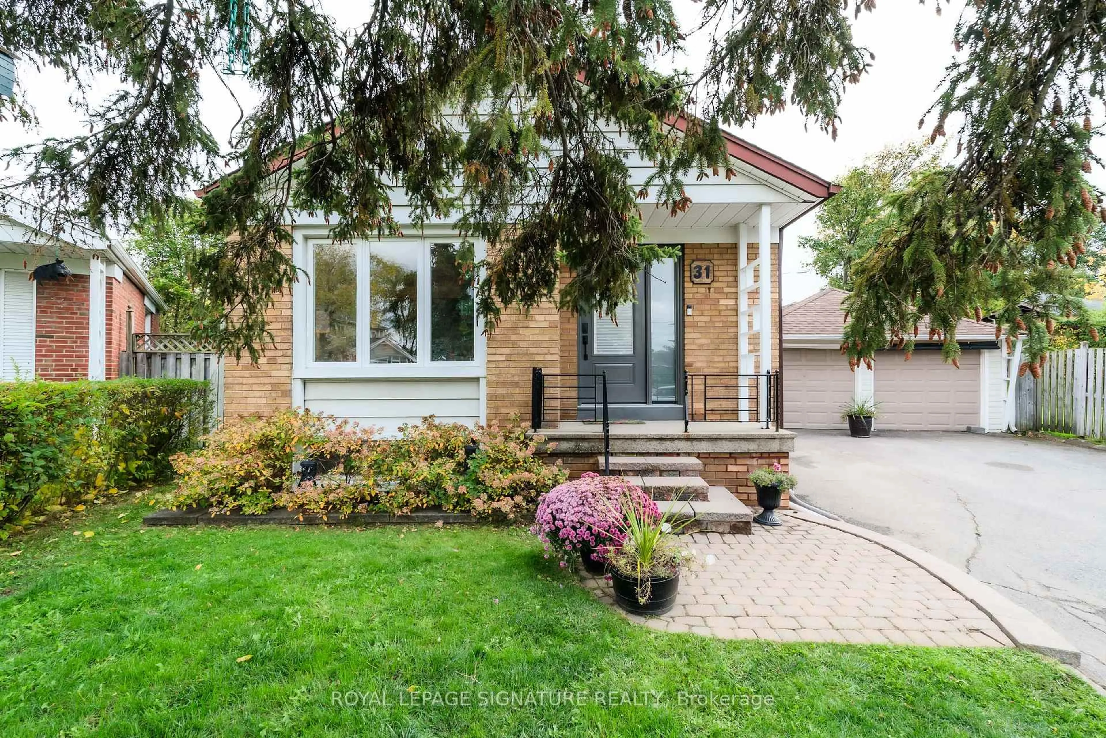 Home with brick exterior material, street for 31 Castille Ave, Toronto Ontario M1R 2C2