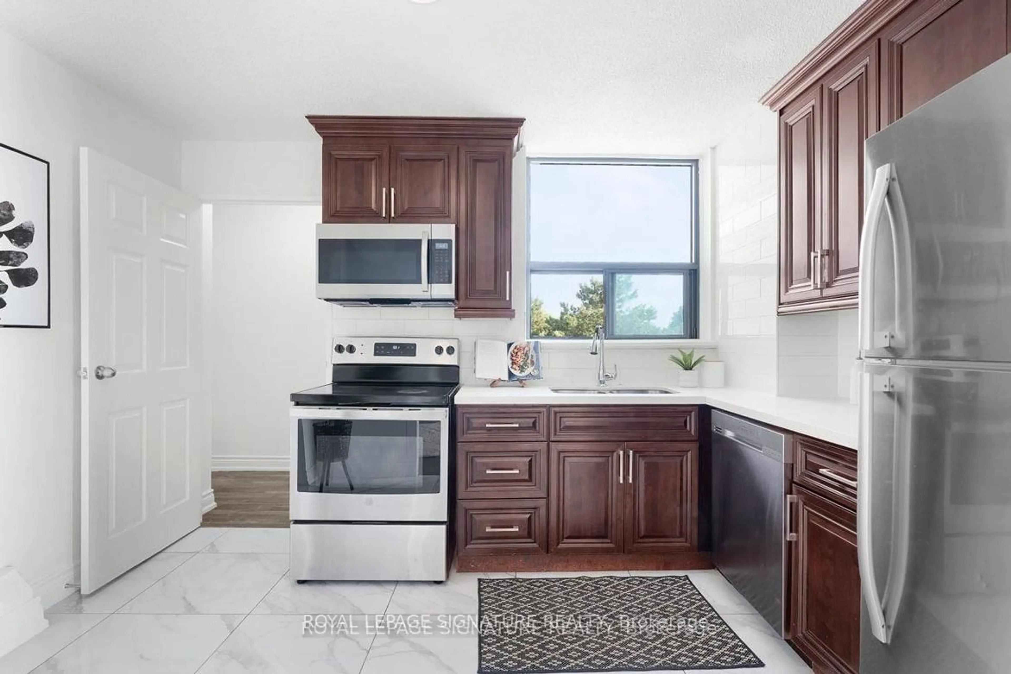 Standard kitchen, ceramic/tile floor for 100 Wingarden Crt #315, Toronto Ontario M1B 2P4