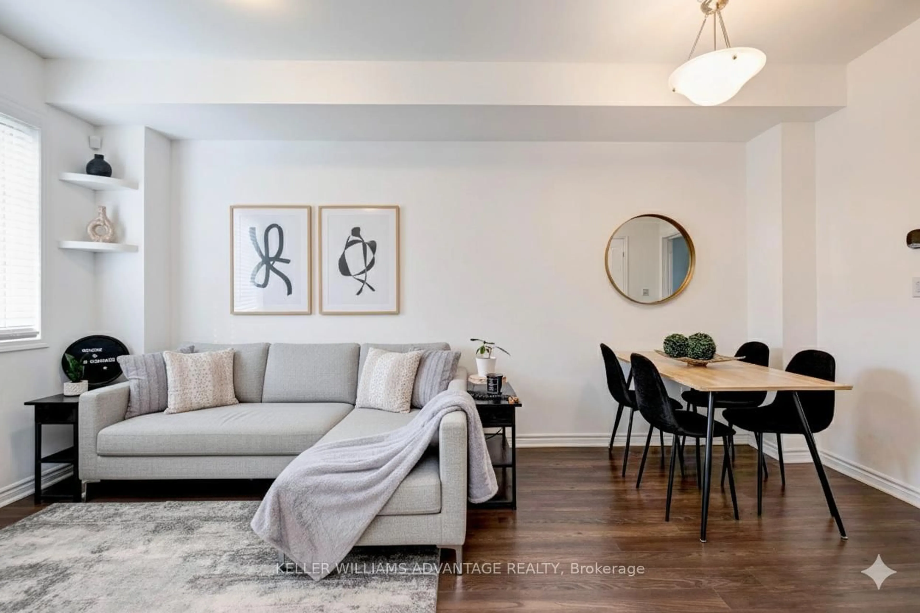 Living room with furniture, wood/laminate floor for 148 Cleanside Rd, Toronto Ontario M1L 0J3