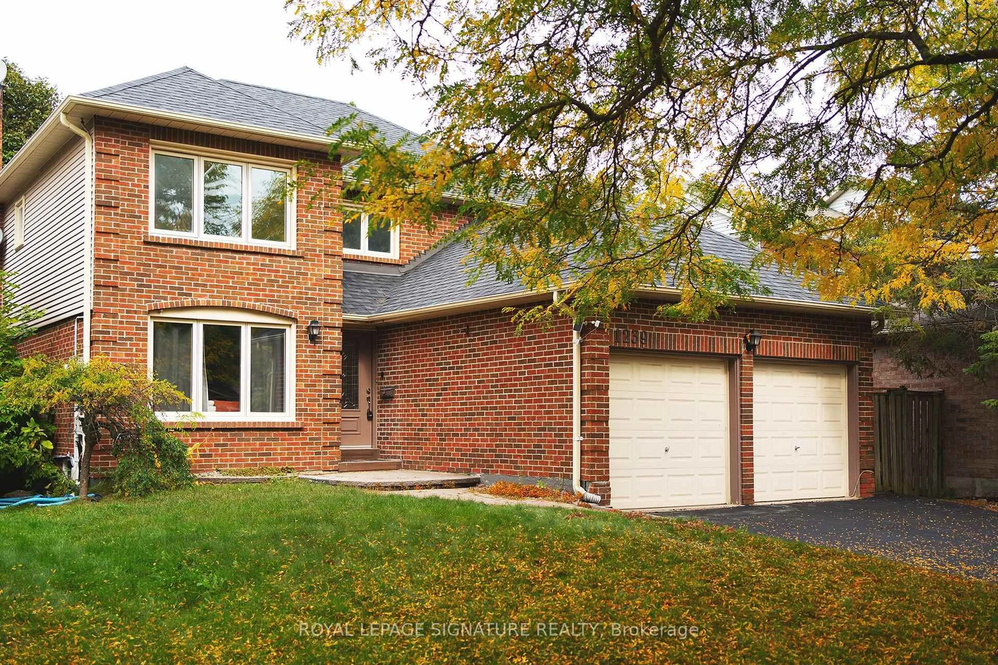 Home with brick exterior material, street for 1239 Barnwood Sq, Pickering Ontario L1X 1C6
