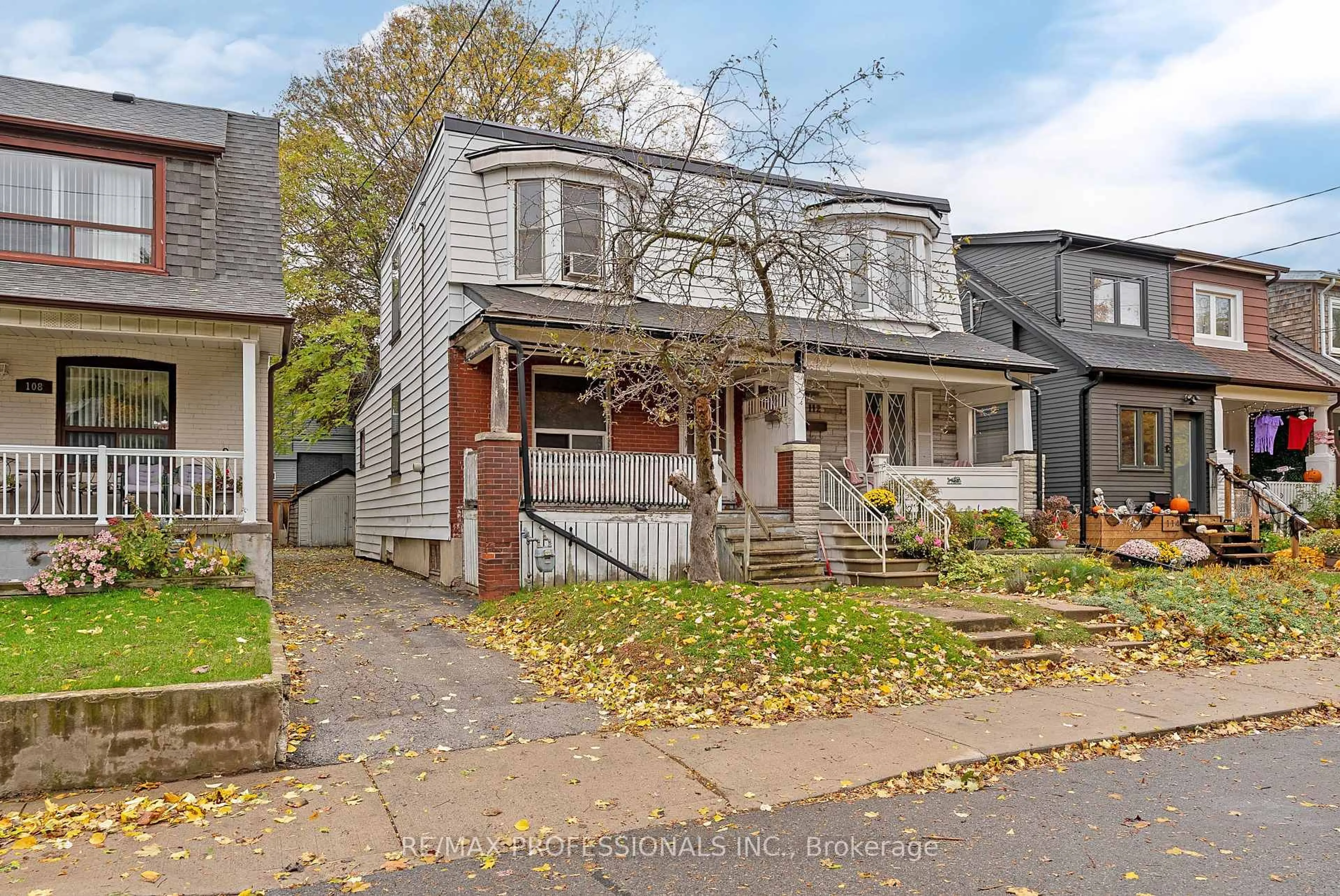 Home with brick exterior material, street for 110 Bastedo Ave, Toronto Ontario M4C 3N1