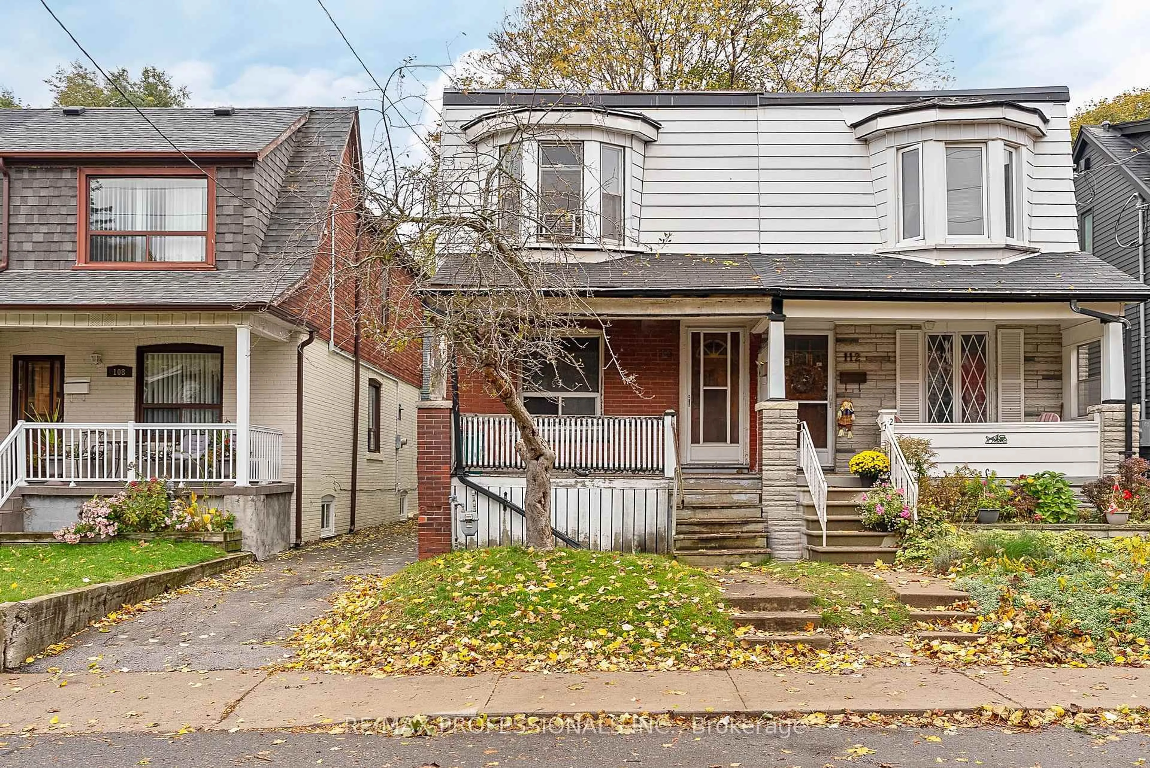 Home with brick exterior material, street for 110 Bastedo Ave, Toronto Ontario M4C 3N1