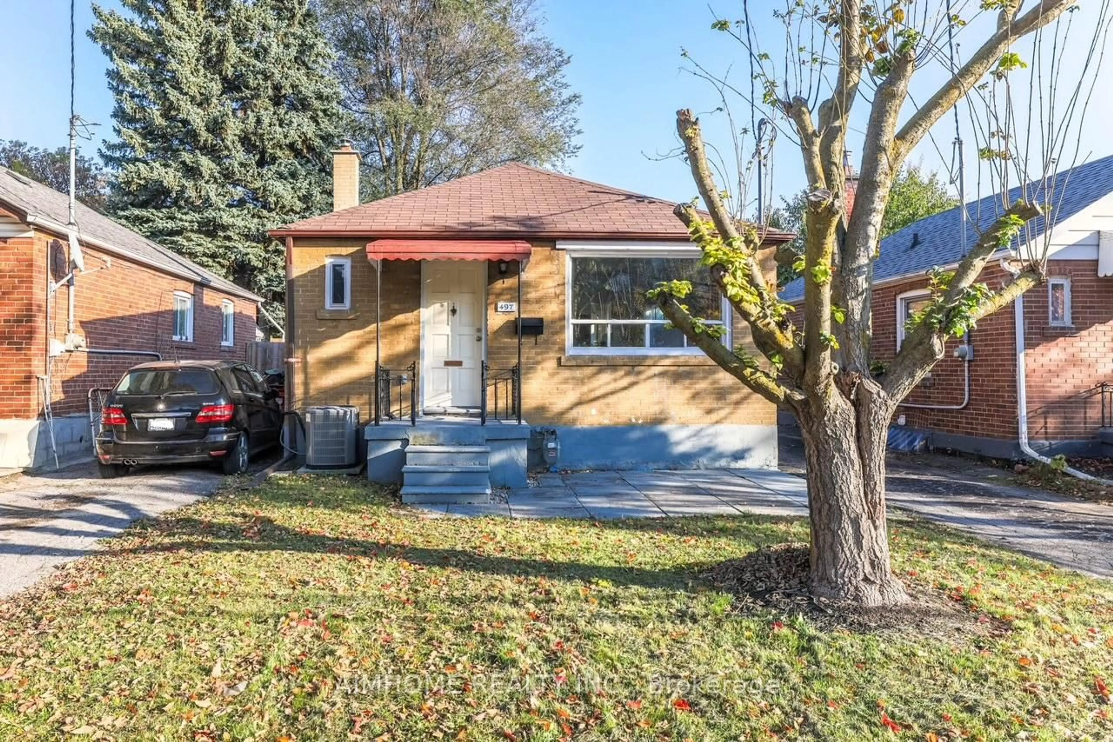 Home with brick exterior material, street for 497 Dawes Rd, Toronto Ontario M4B 2G5