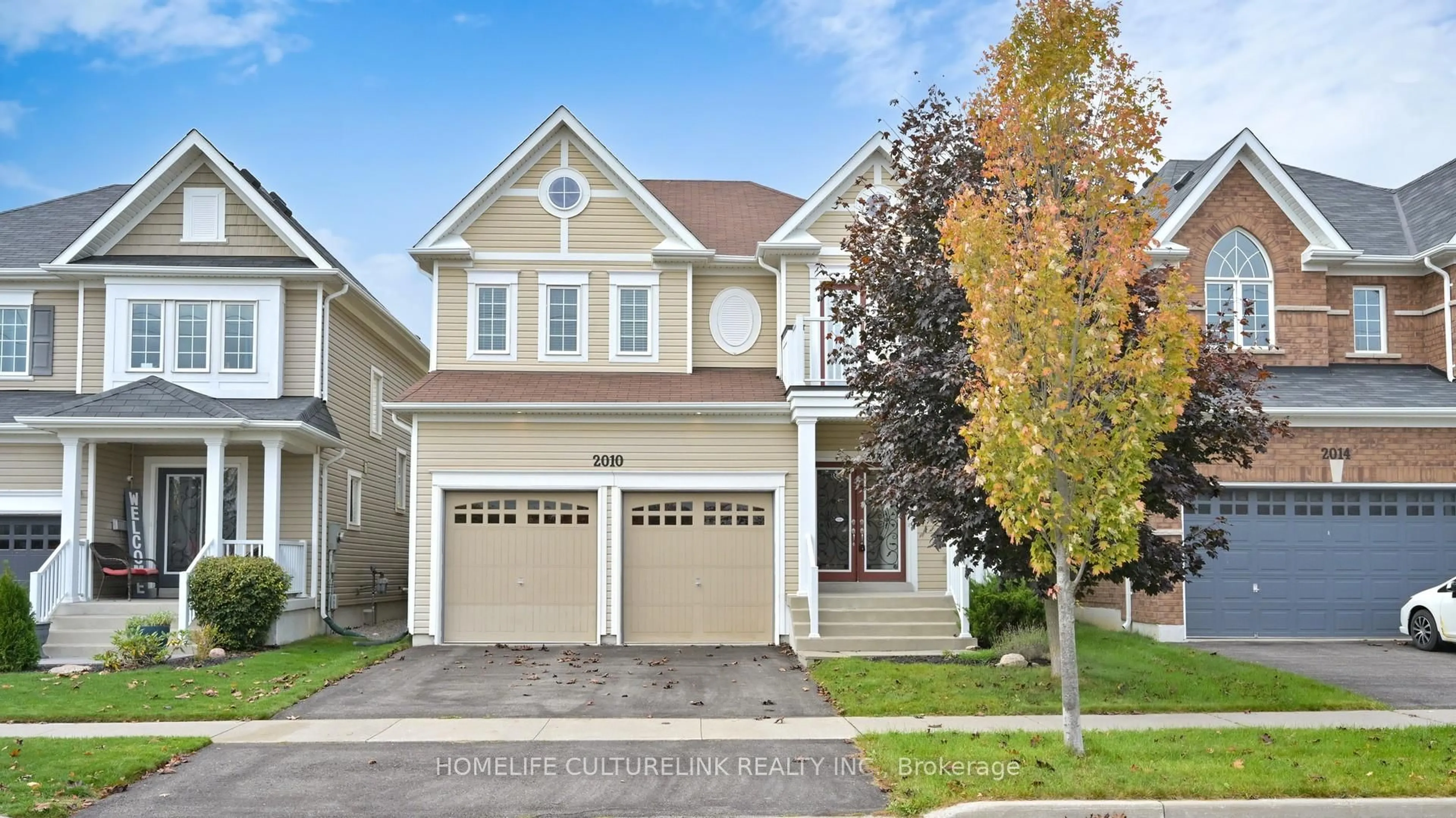 Home with vinyl exterior material, street for 2010 Hunking Dr, Oshawa Ontario L1K 0V3