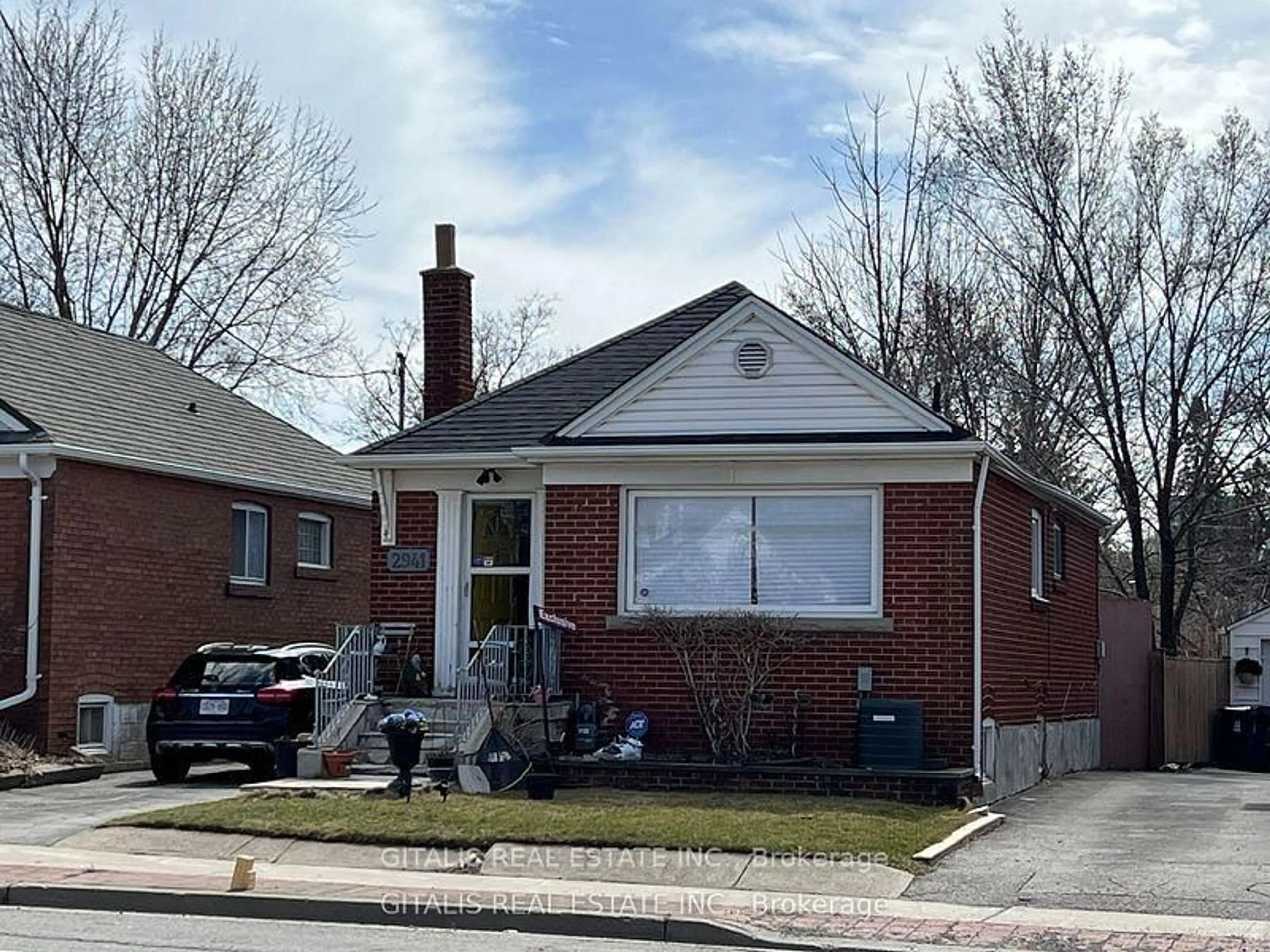 Home with brick exterior material, street for 2941 St Clair Ave, Toronto Ontario M4B 1N9
