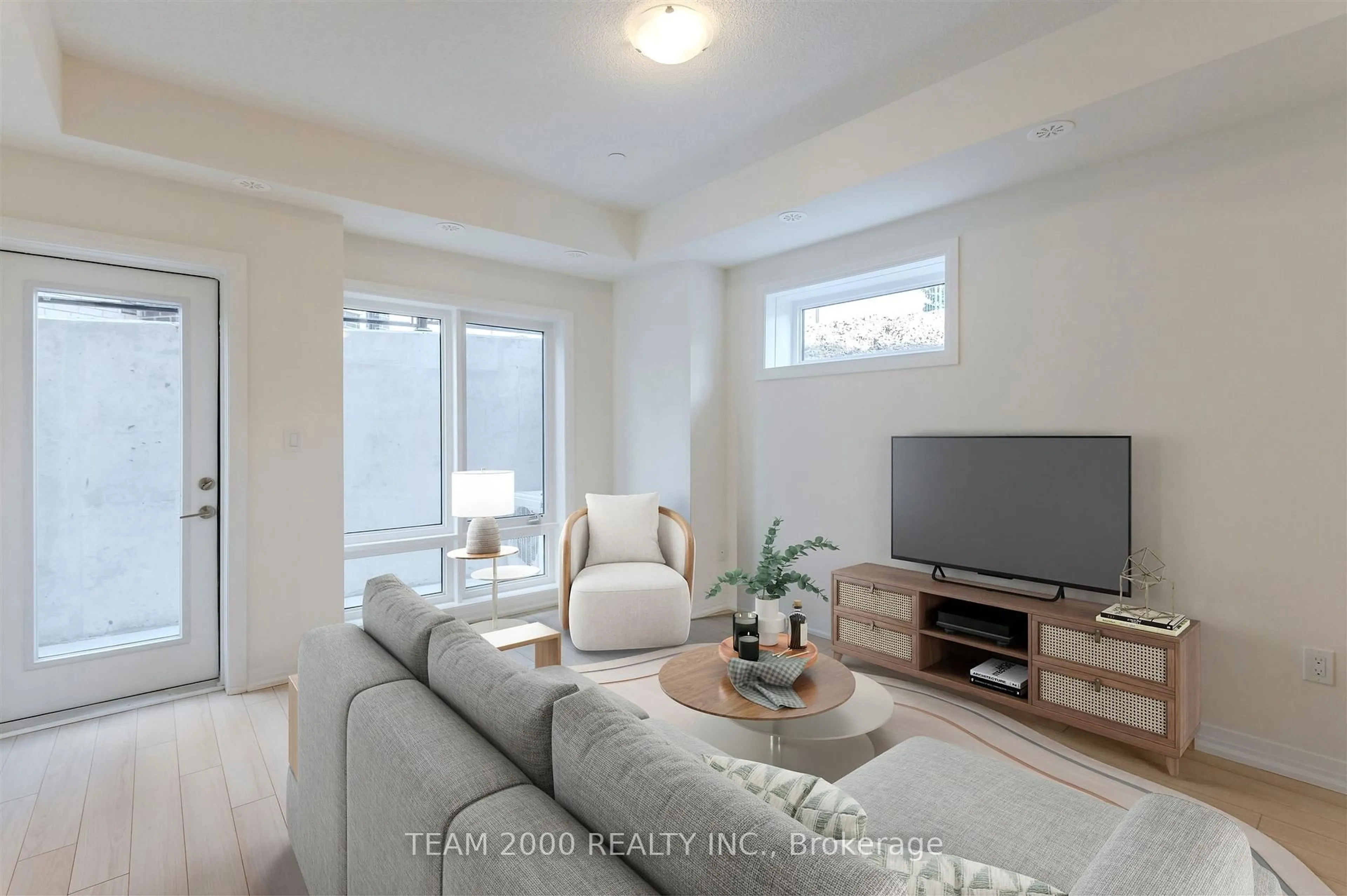 Living room with furniture, unknown for 145 Tapscott Rd #1, Toronto Ontario M1B 0E8