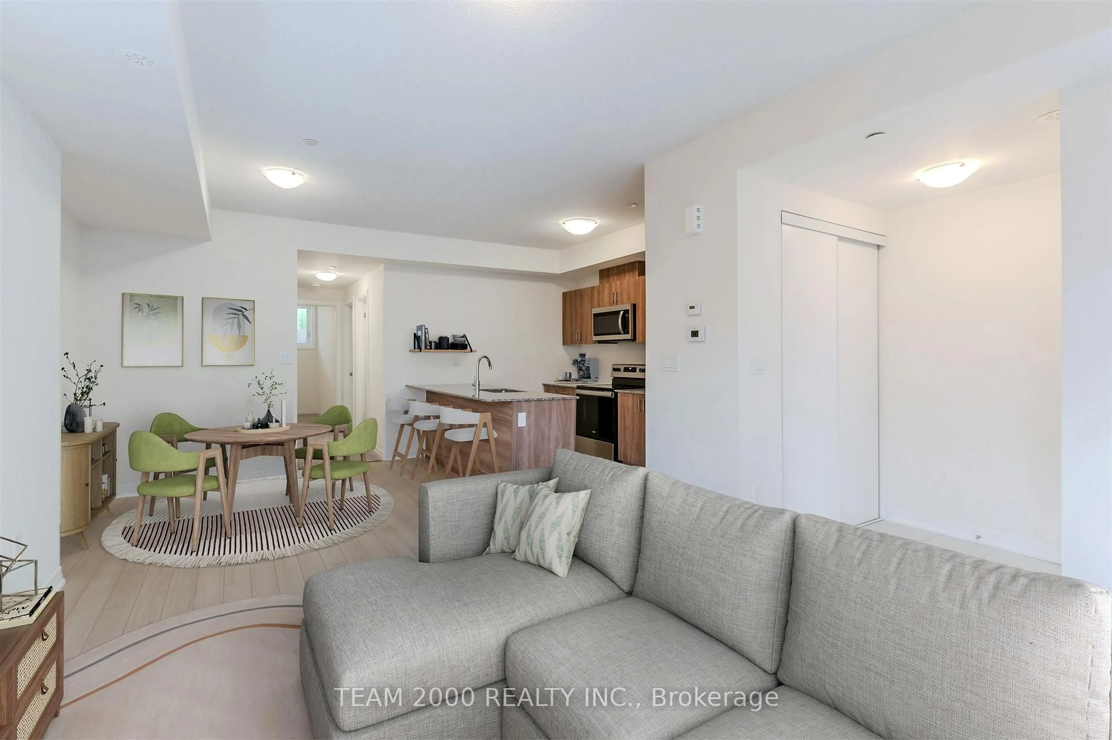 Living room with furniture, unknown for 145 Tapscott Rd #1, Toronto Ontario M1B 0E8