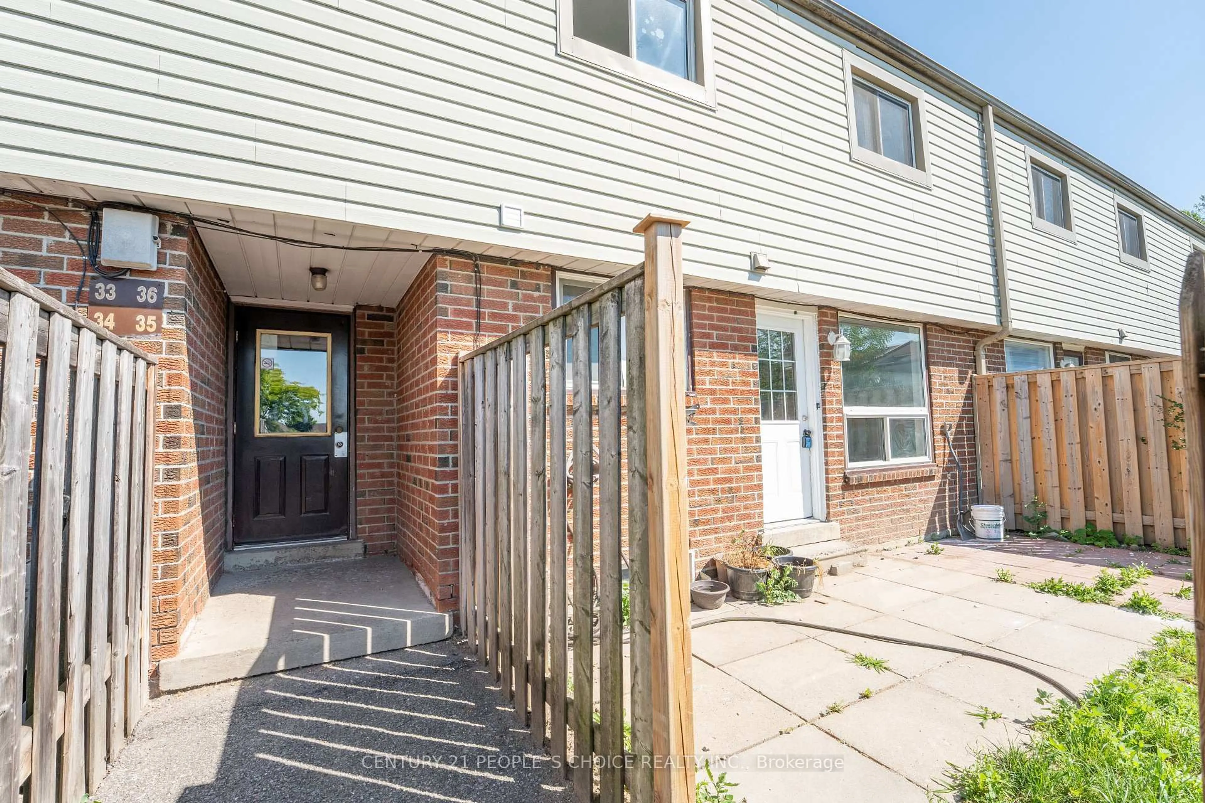 A pic from outside/outdoor area/front of a property/back of a property/a pic from drone, street for 120 Nonquon Rd #35, Oshawa Ontario L1G 7E6