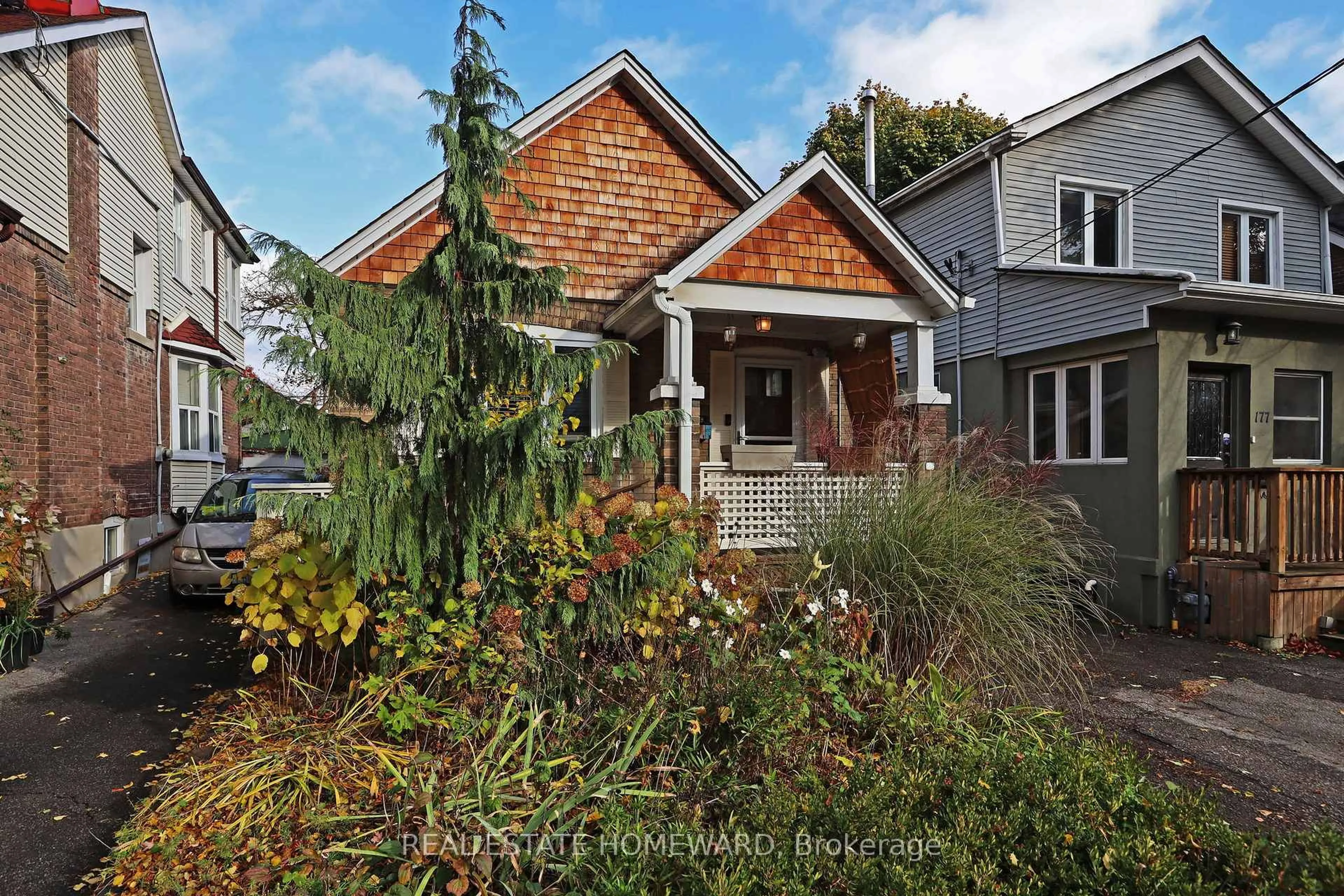 Home with brick exterior material, street for 179 Woodfield Rd, Toronto Ontario M4L 2W8