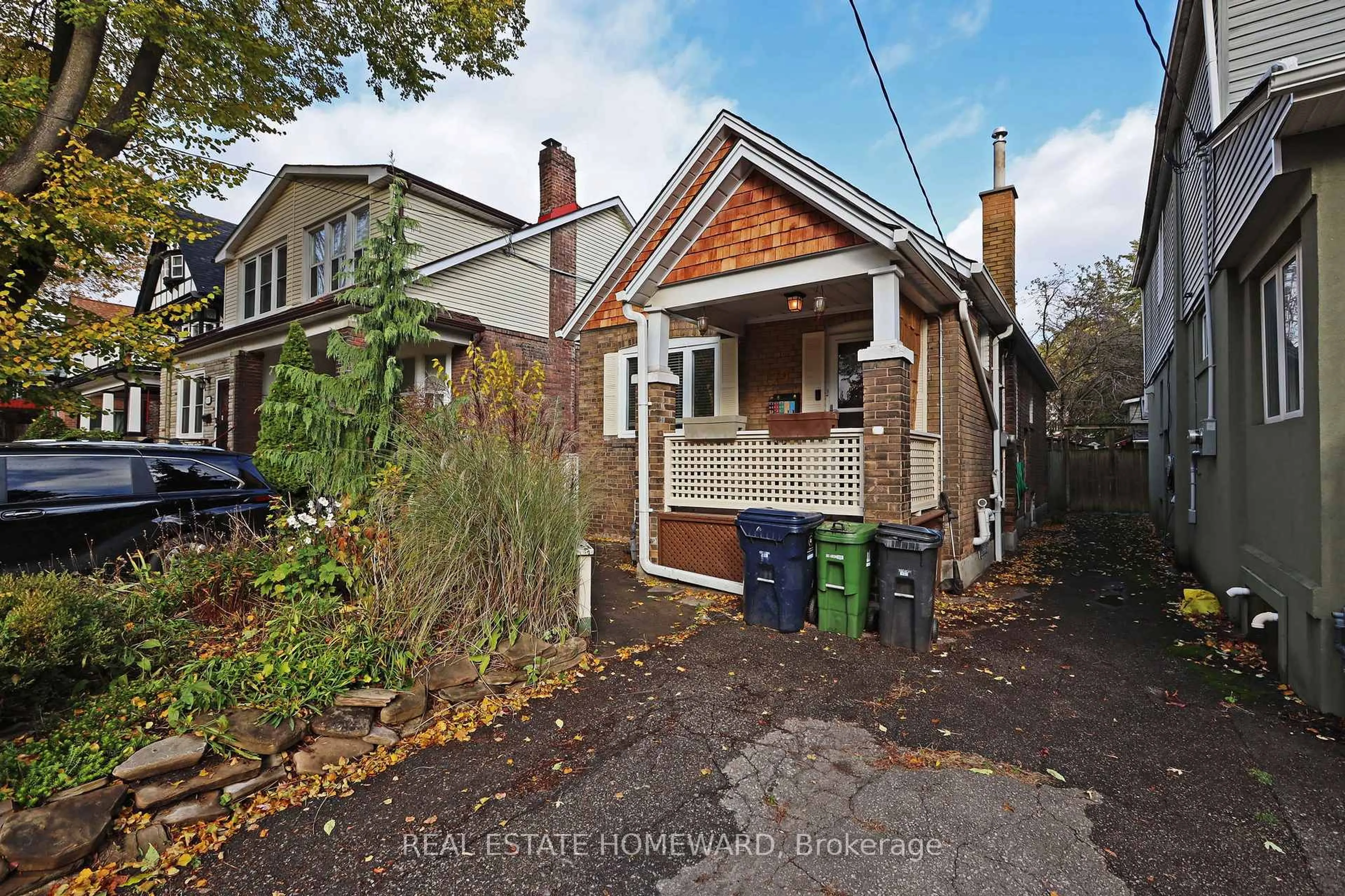 Home with brick exterior material, street for 179 Woodfield Rd, Toronto Ontario M4L 2W8