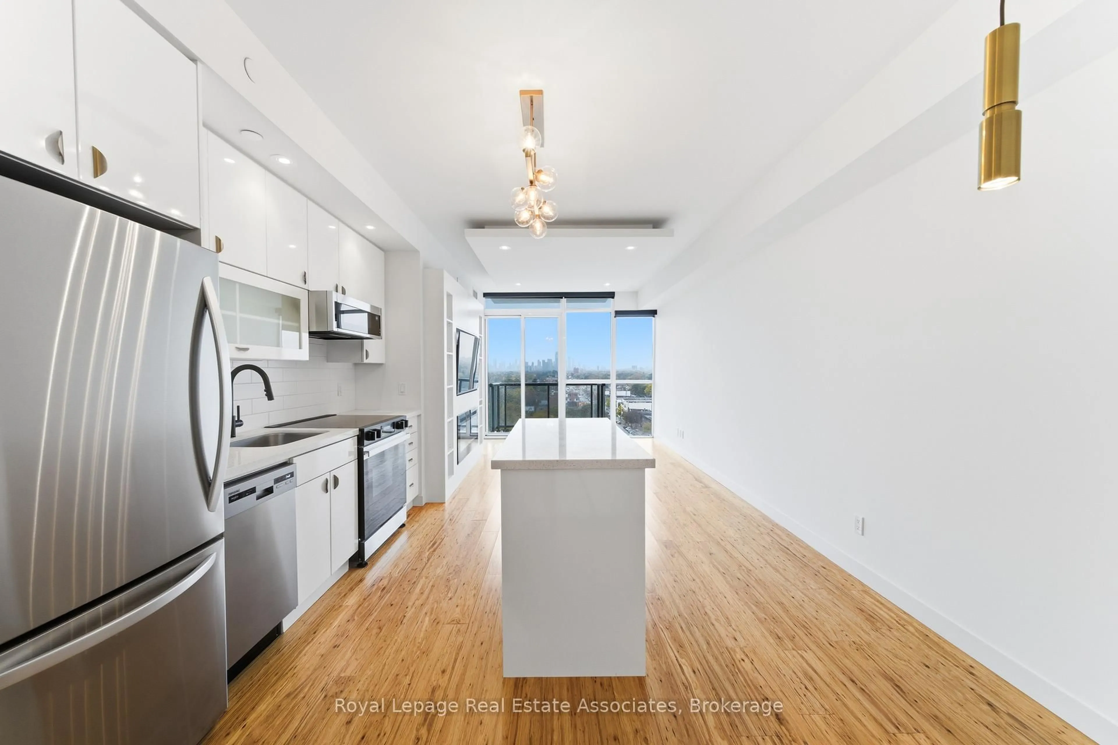 Open concept kitchen, unknown for 2055 Danforth Ave #915, Toronto Ontario M4C 1J8
