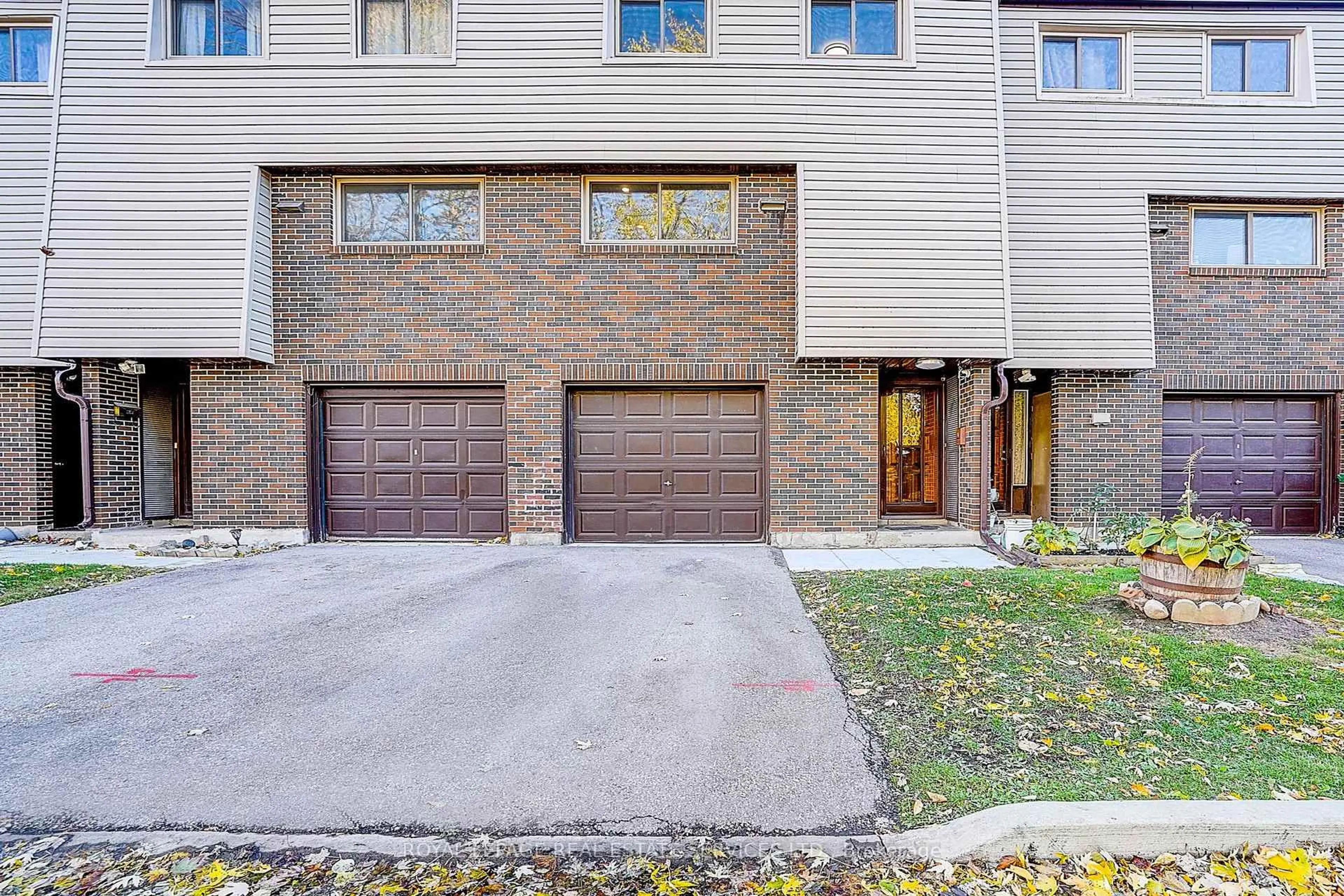 Home with brick exterior material, street for 2020 Pharmacy Ave #23, Toronto Ontario M1T 1H8