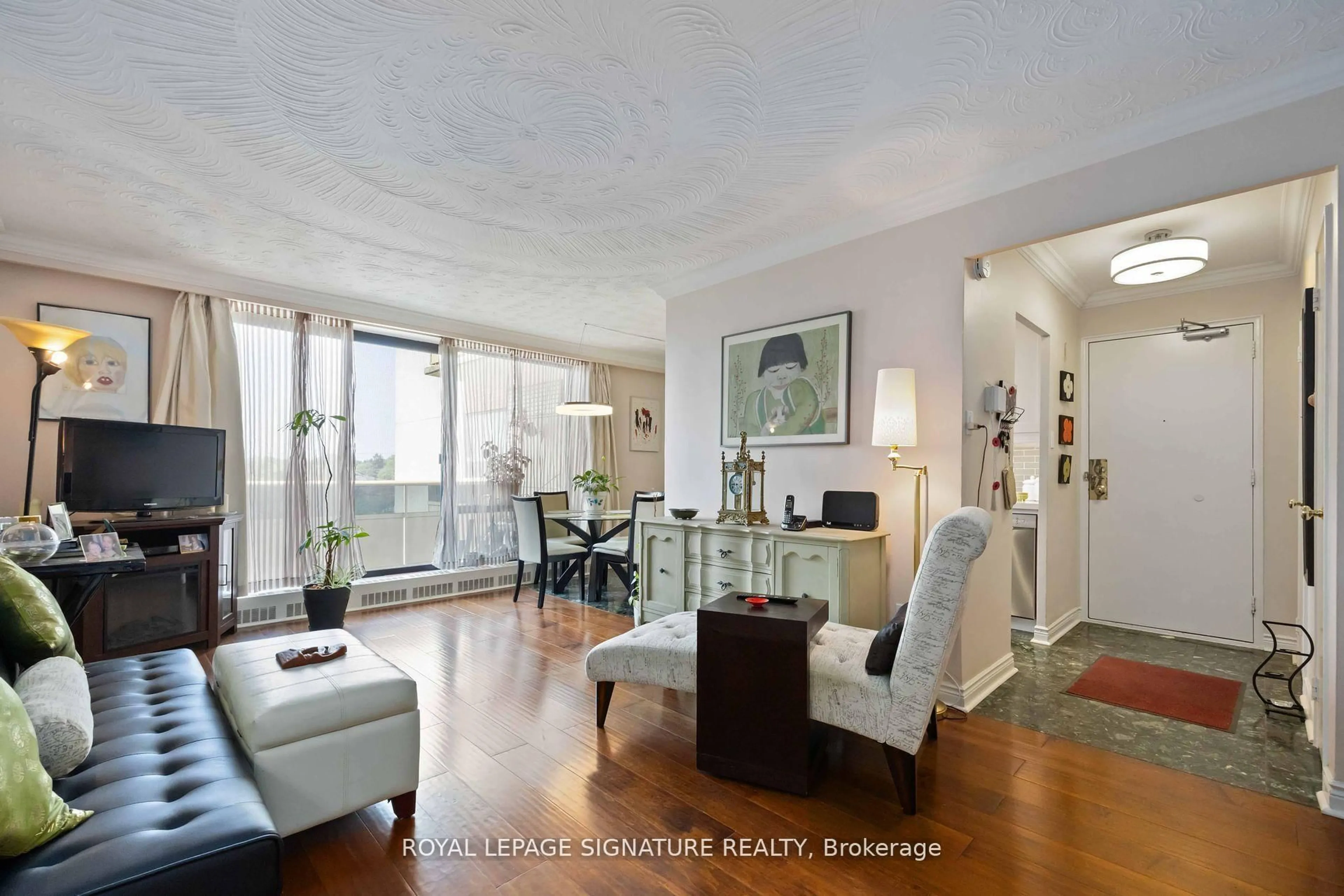 Living room with furniture, unknown for 921 Midland Ave #502, Toronto Ontario M1K 4G2