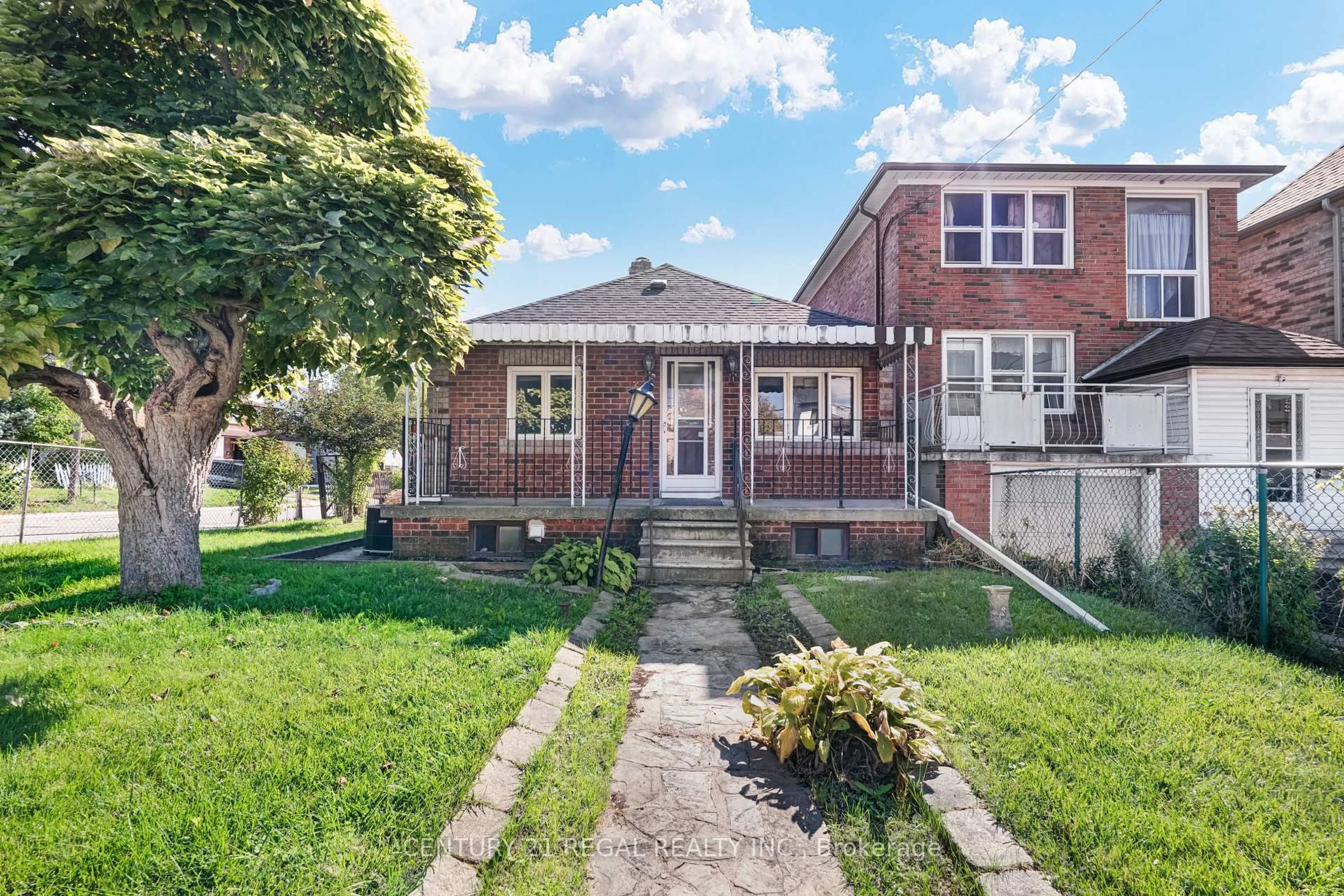 Home with brick exterior material, street for 39 Butterworth Ave, Toronto Ontario M1L 1H2