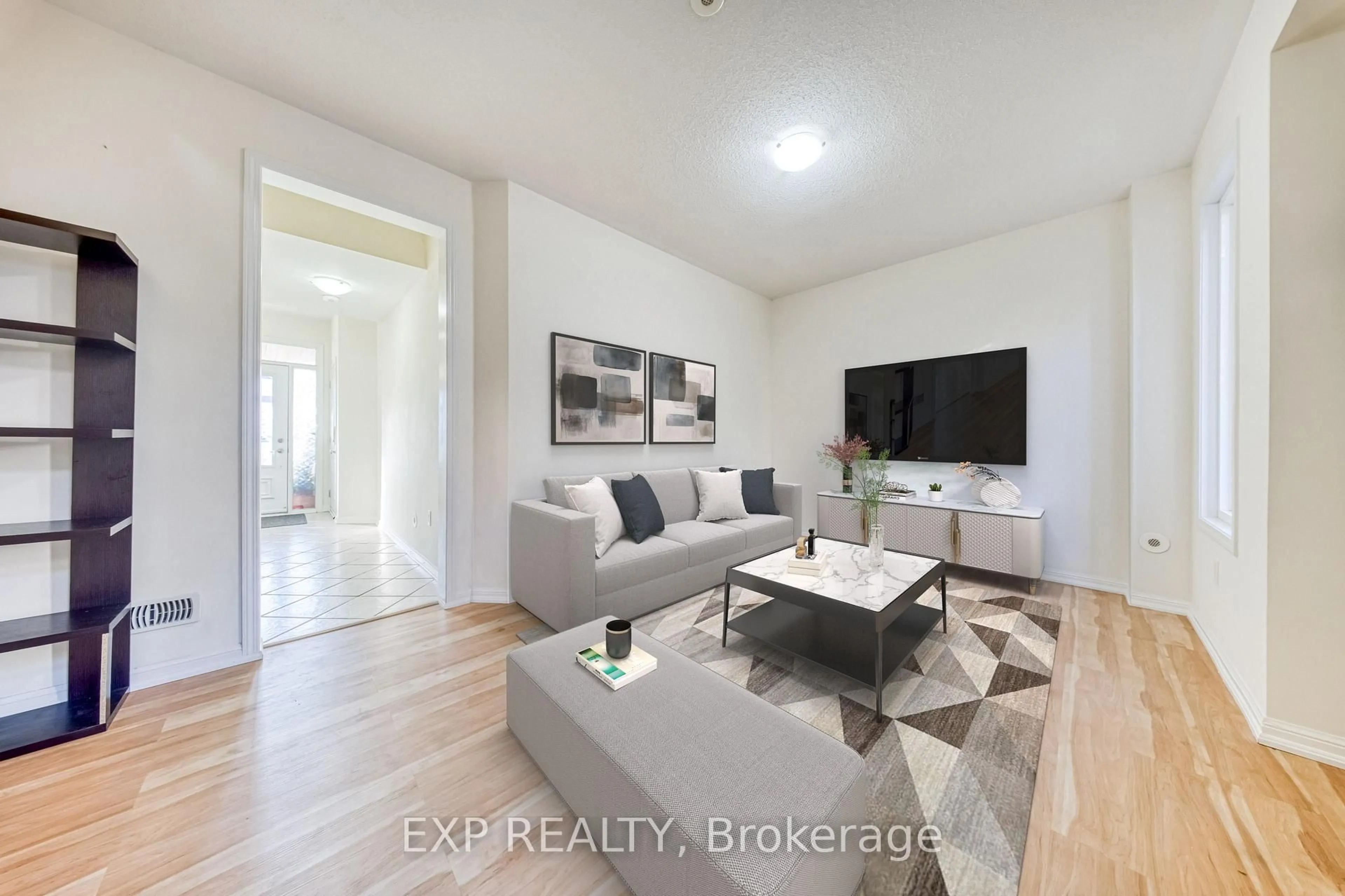 Living room with furniture, wood/laminate floor for 30 Yates Ave, Toronto Ontario M1L 0C8