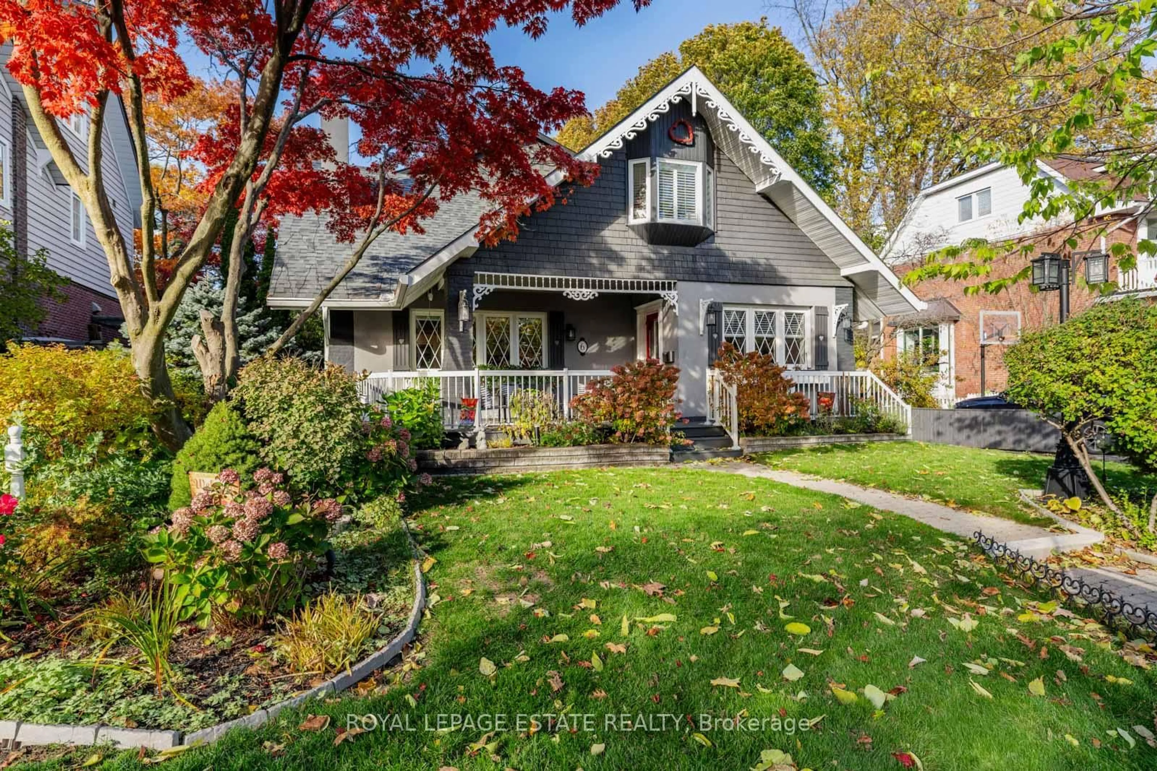 Home with vinyl exterior material, street for 6 Bracken Ave, Toronto Ontario M4E 1N2