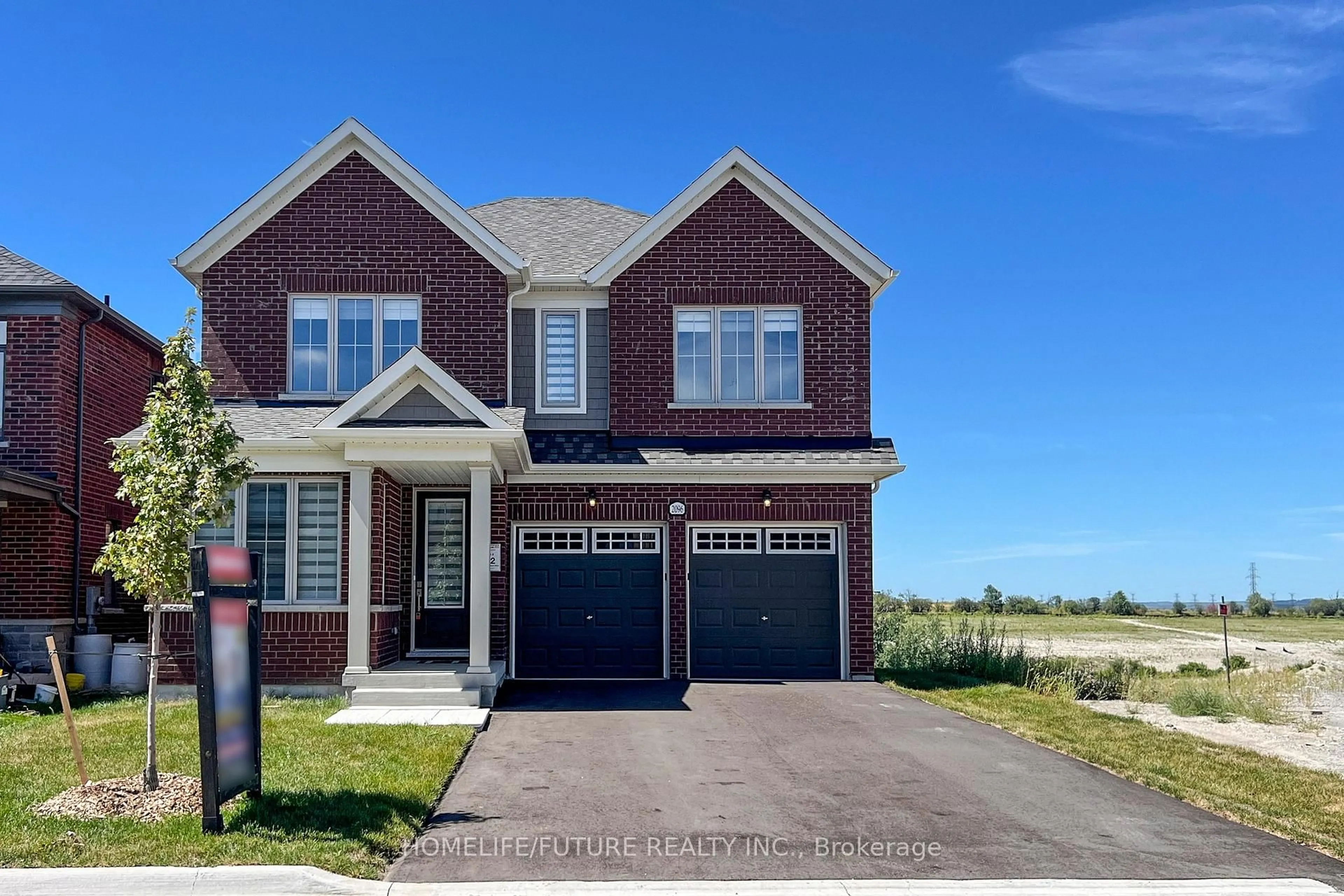 Home with brick exterior material, street for 2096 Chris Mason St, Oshawa Ontario L1L 0S6