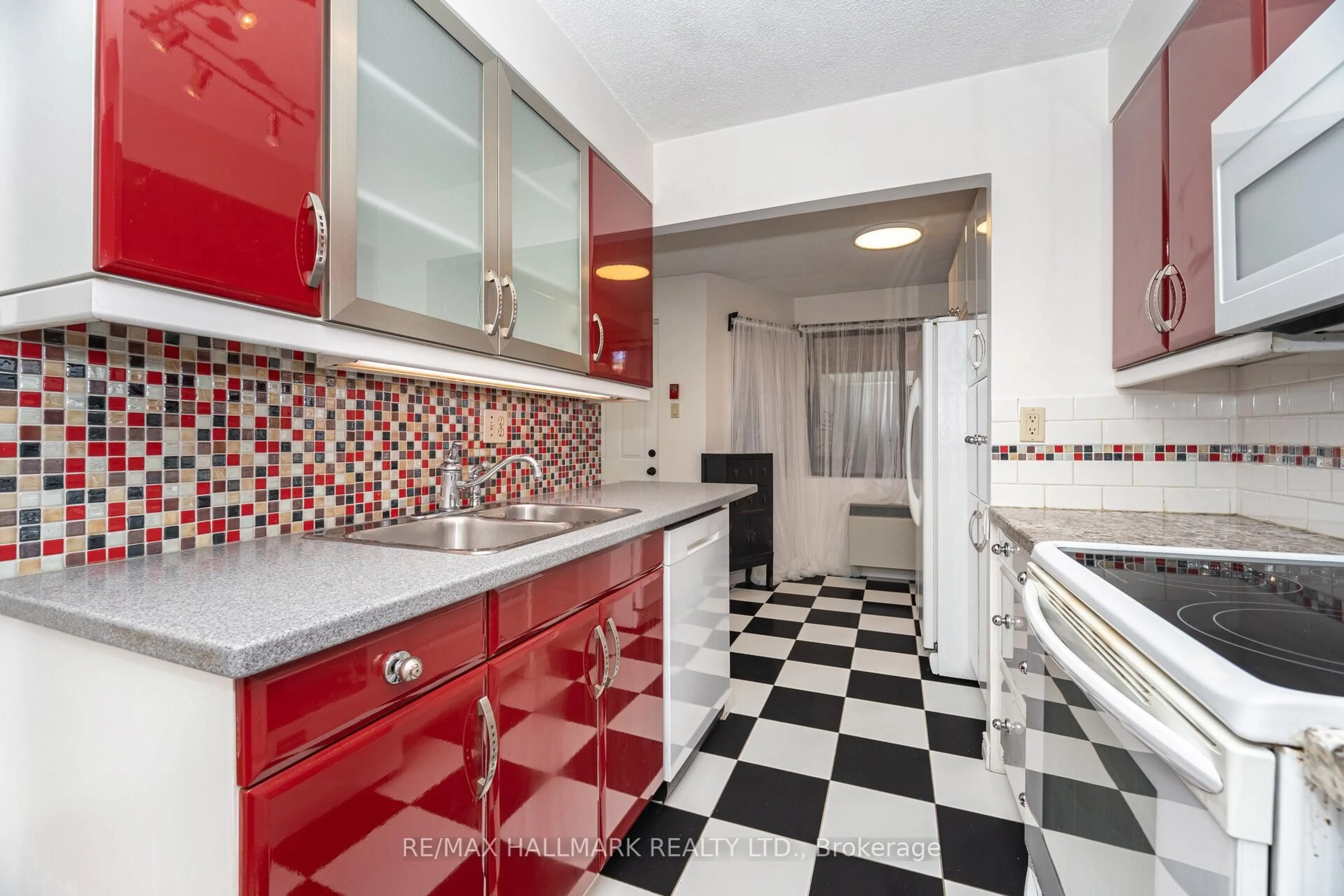 Standard kitchen, ceramic/tile floor for 2112 Queen St ##10, Toronto Ontario M4E 1E2