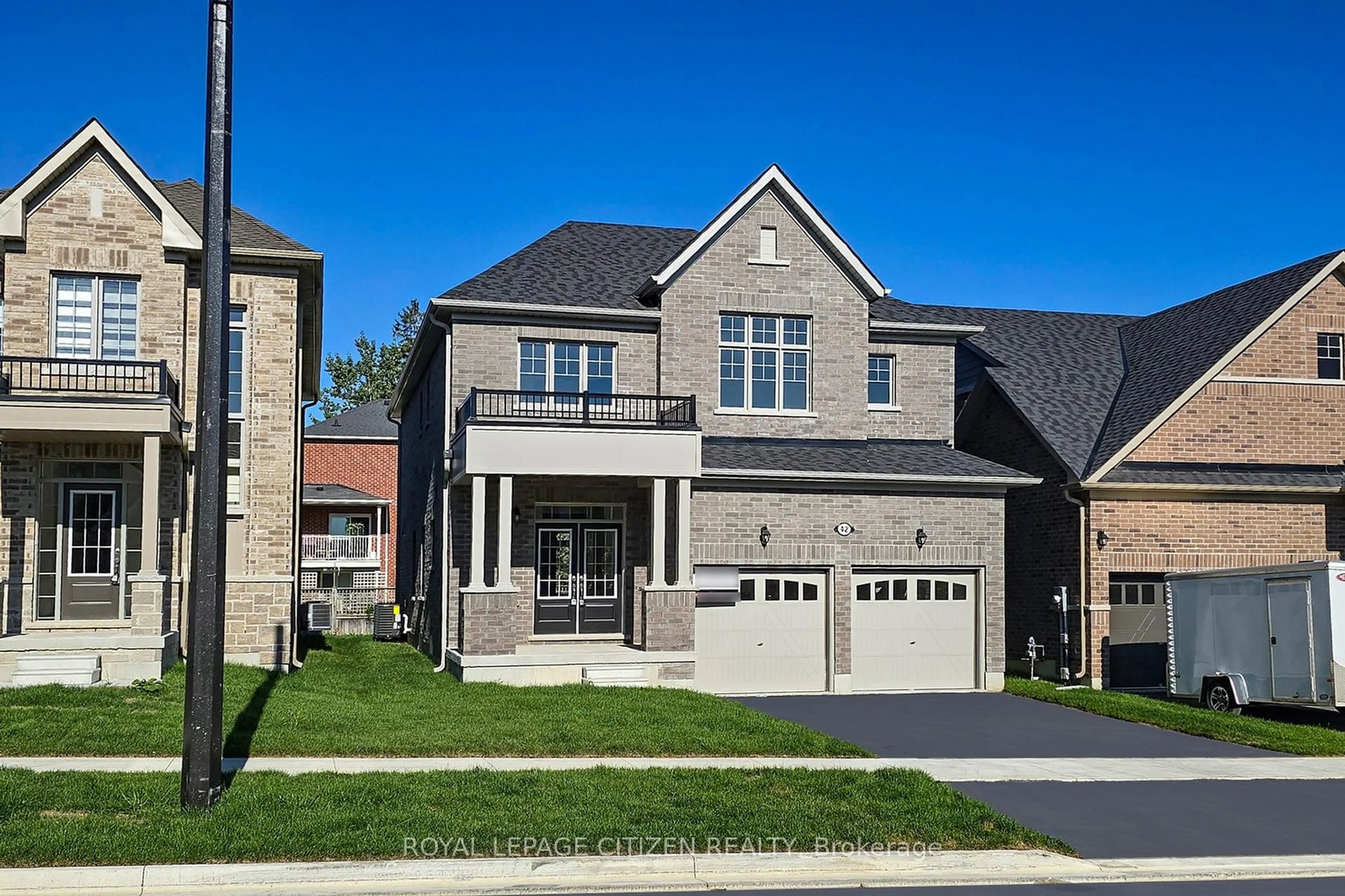Home with brick exterior material, street for 42 North Garden Blvd, Scugog Ontario L9L 1B3