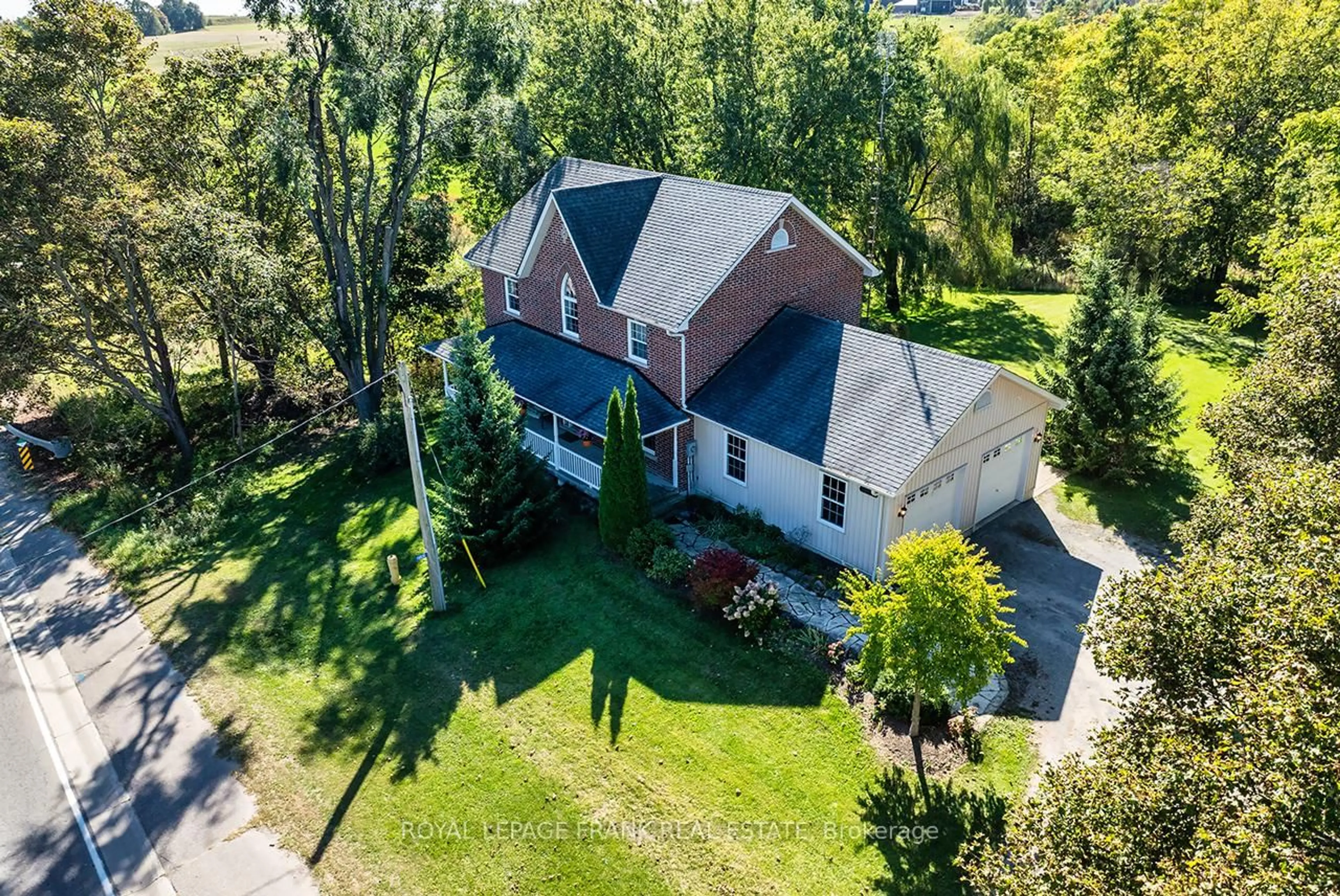 A pic from outside/outdoor area/front of a property/back of a property/a pic from drone, unknown for 19826 Highway 12 Highway, Scugog Ontario L0C 1B0