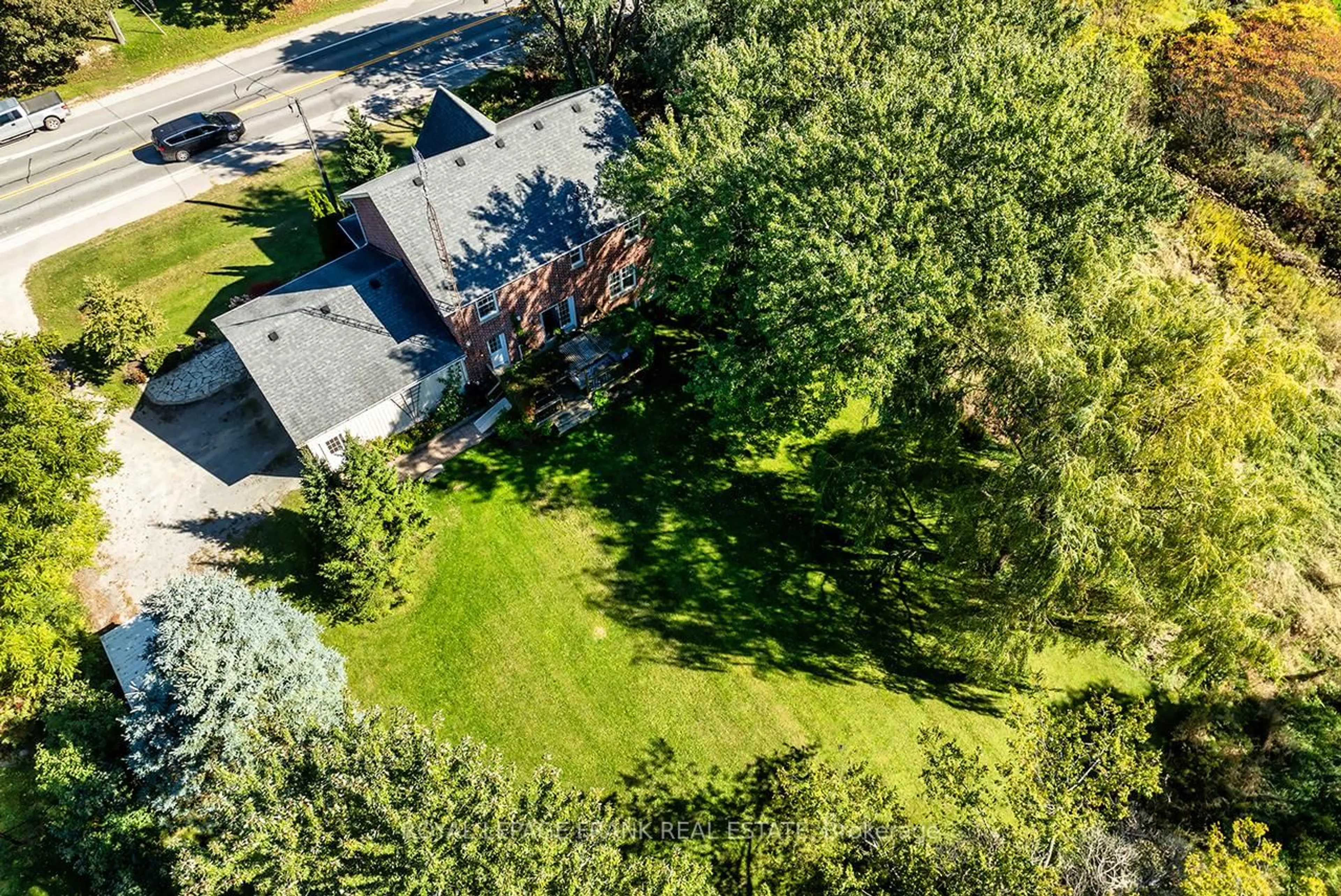 A pic from outside/outdoor area/front of a property/back of a property/a pic from drone, unknown for 19826 Highway 12 Highway, Scugog Ontario L0C 1B0