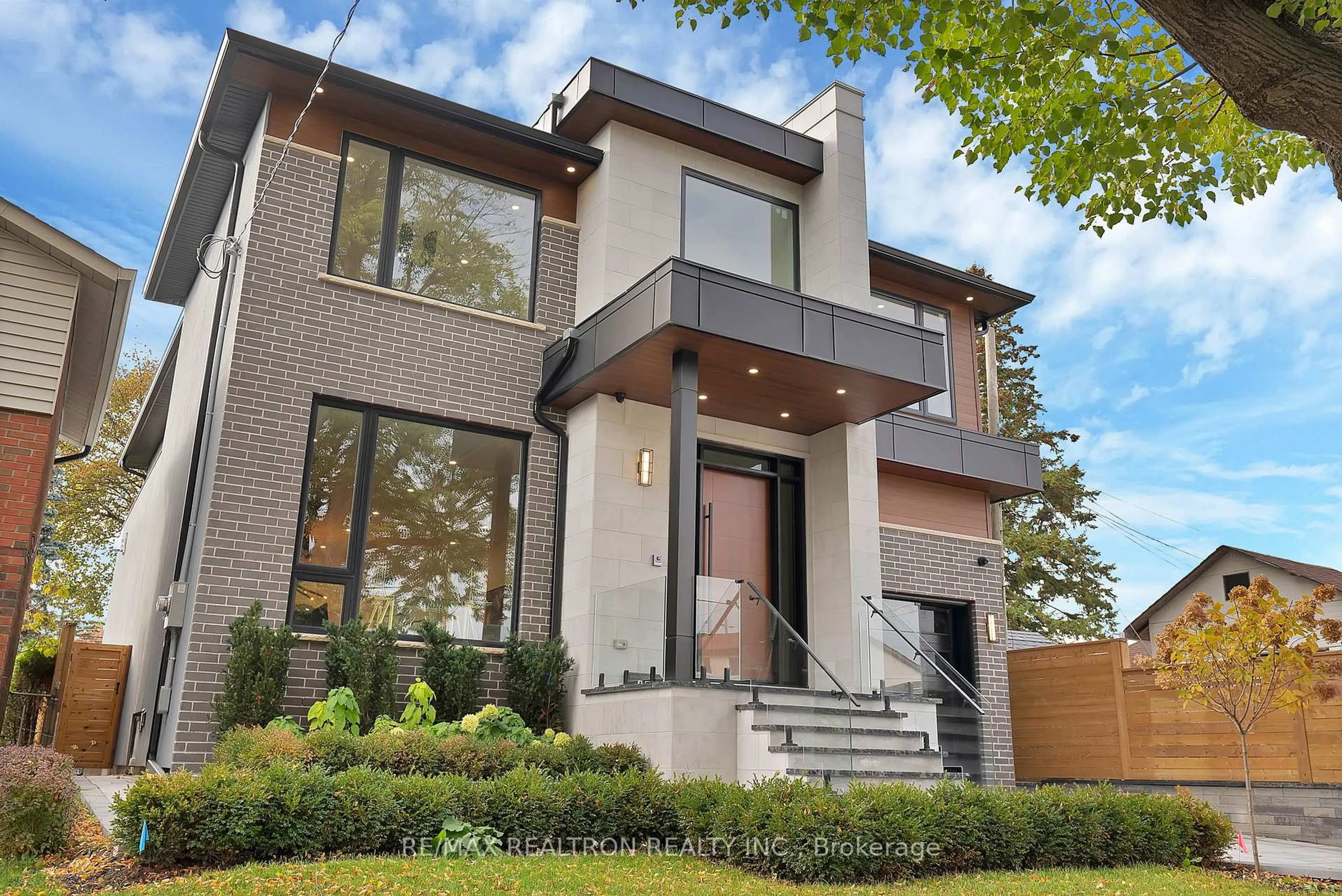 Home with brick exterior material, street for 18 Glen Eden Cres, Toronto Ontario M4B 2X9