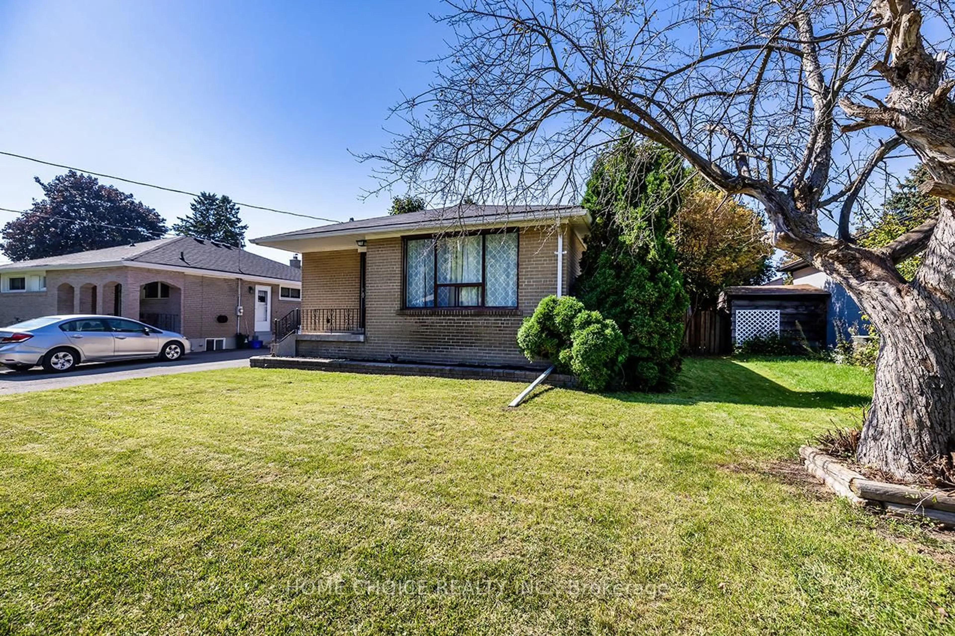 Home with brick exterior material, street for 1014 Centre St, Whitby Ontario L1N 4V3