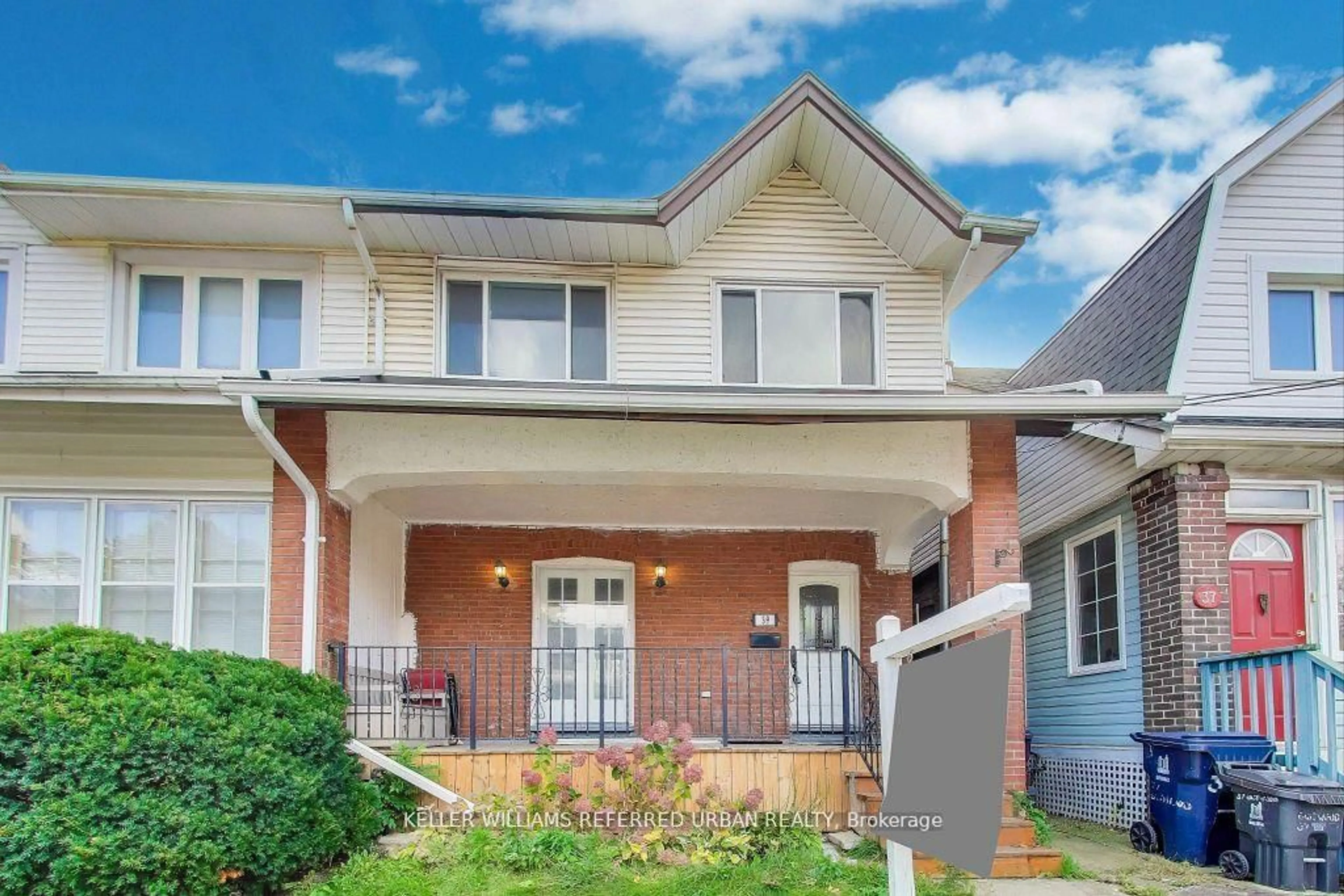 Home with brick exterior material, street for 39 Eastwood Rd, Toronto Ontario M4L 2C6