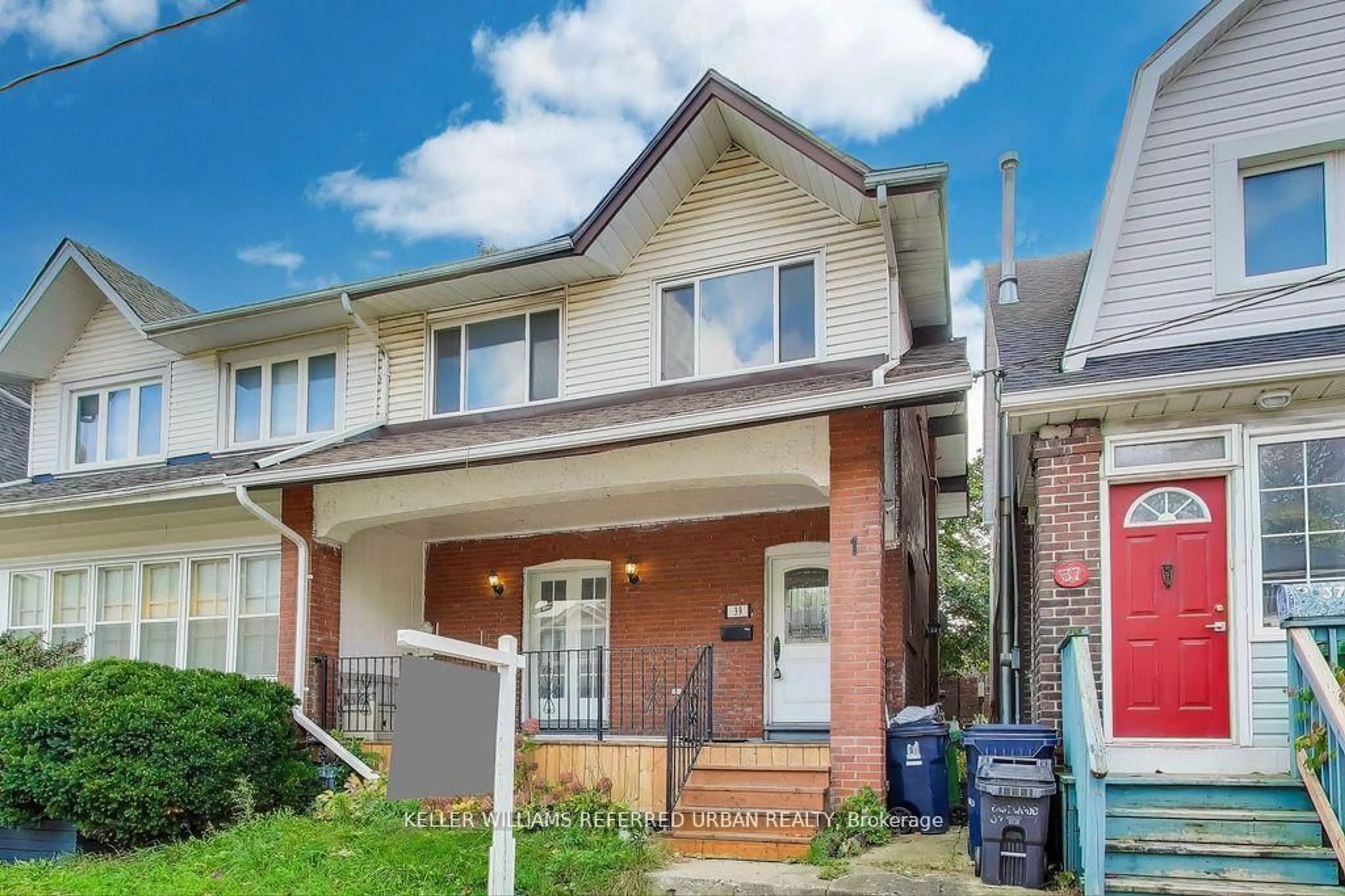 Home with brick exterior material, street for 39 Eastwood Rd, Toronto Ontario M4L 2C6