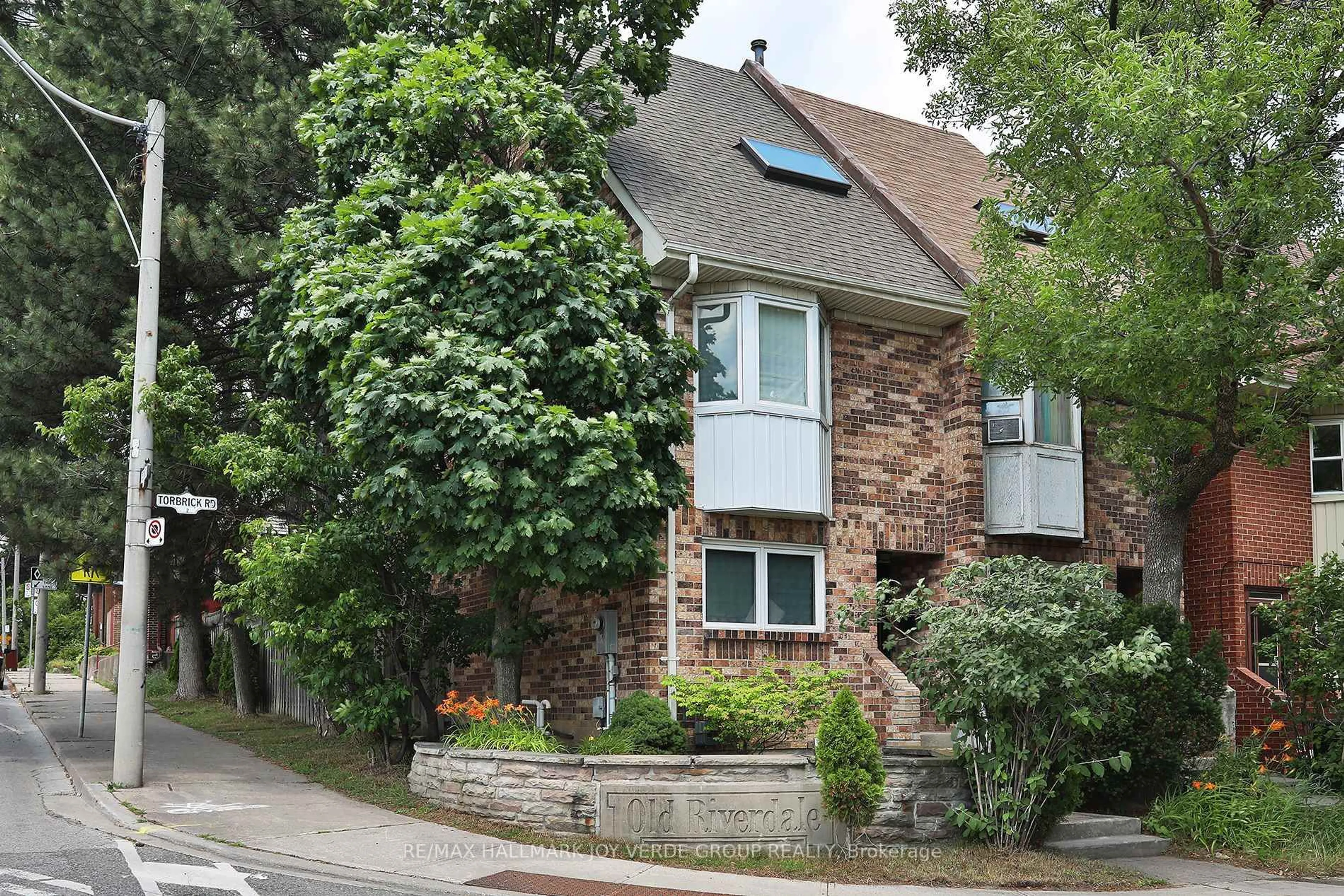 Home with brick exterior material, street for 2 Torbrick Rd, Toronto Ontario M4J 5A5