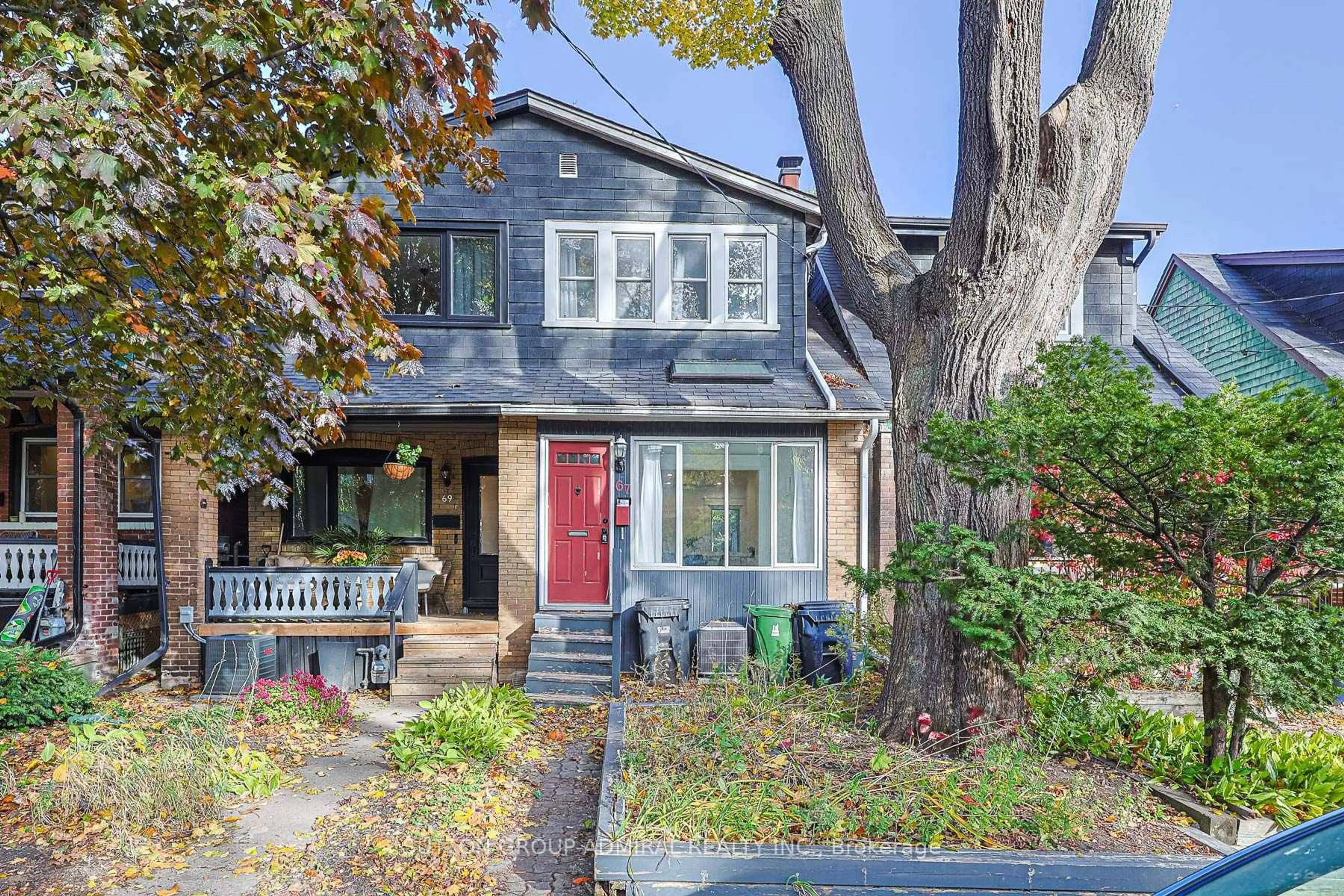 Home with brick exterior material, street for 67 Gainsborough Rd, Toronto Ontario M4L 3C1