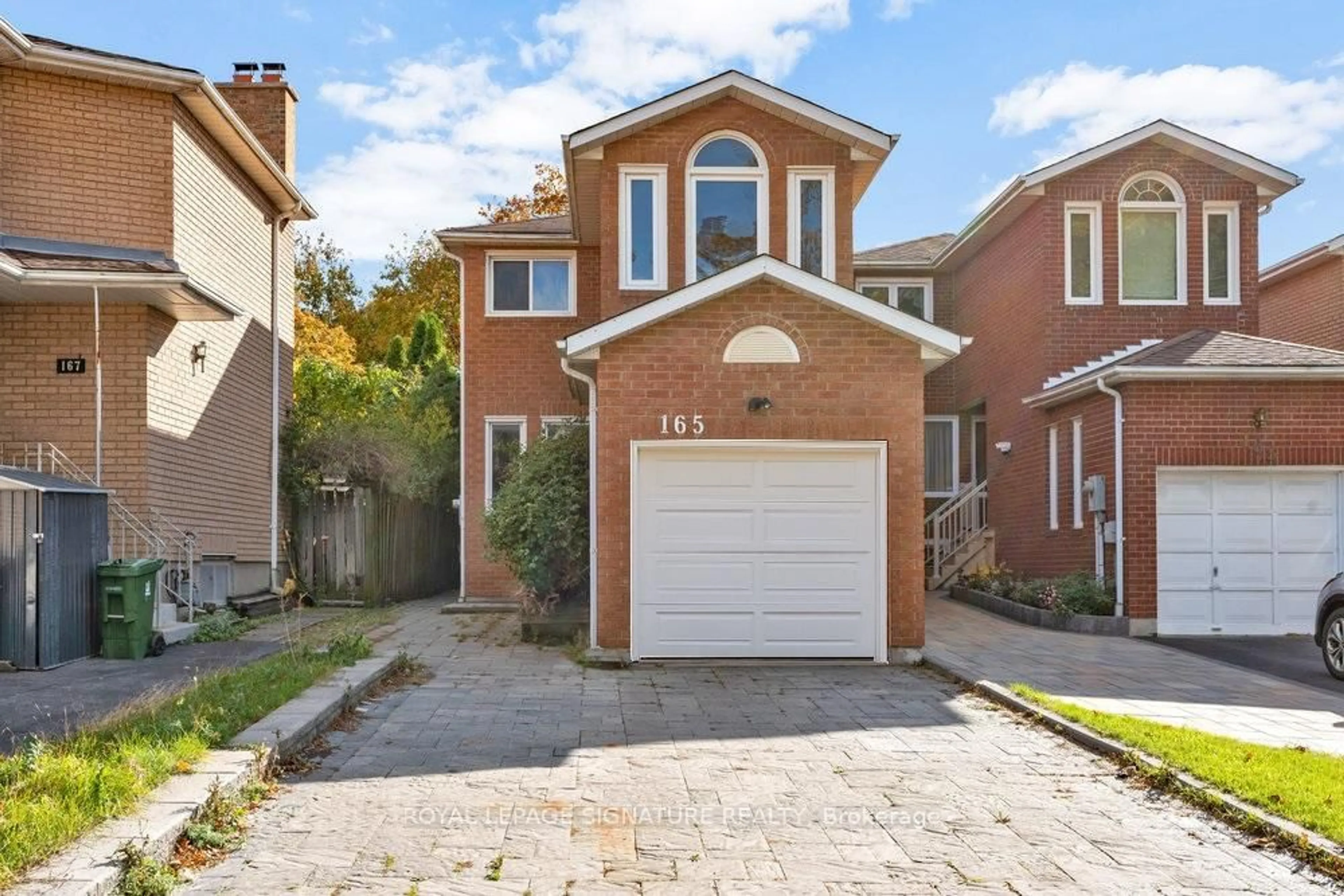Home with brick exterior material, street for 165 Clonmore Dr, Toronto Ontario M1N 1X9