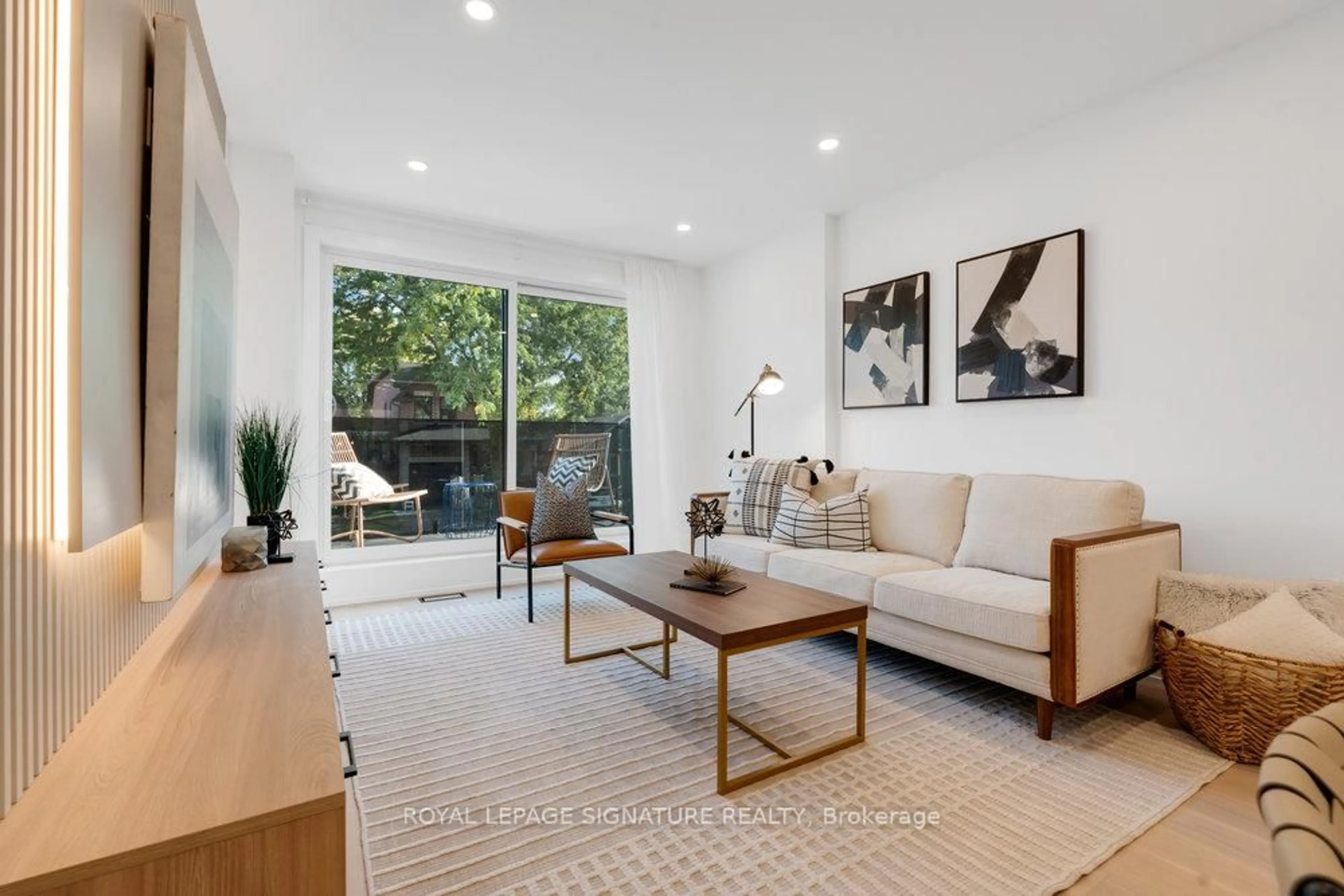 Living room with furniture, unknown for 74B Floyd Ave, Toronto Ontario M4K 2B5