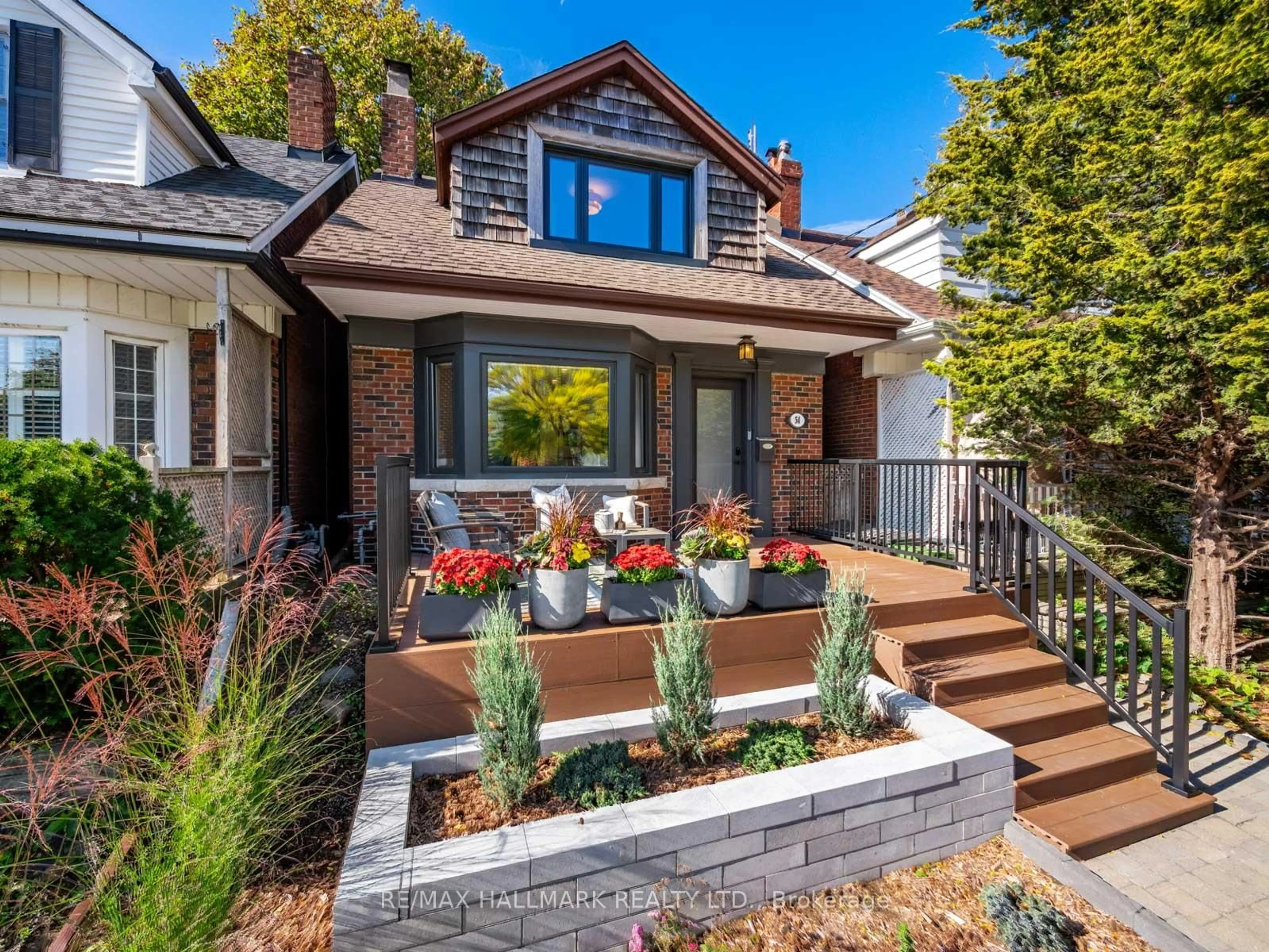 Home with brick exterior material, street for 54 Avonlea Blvd, Toronto Ontario M4C 5E5