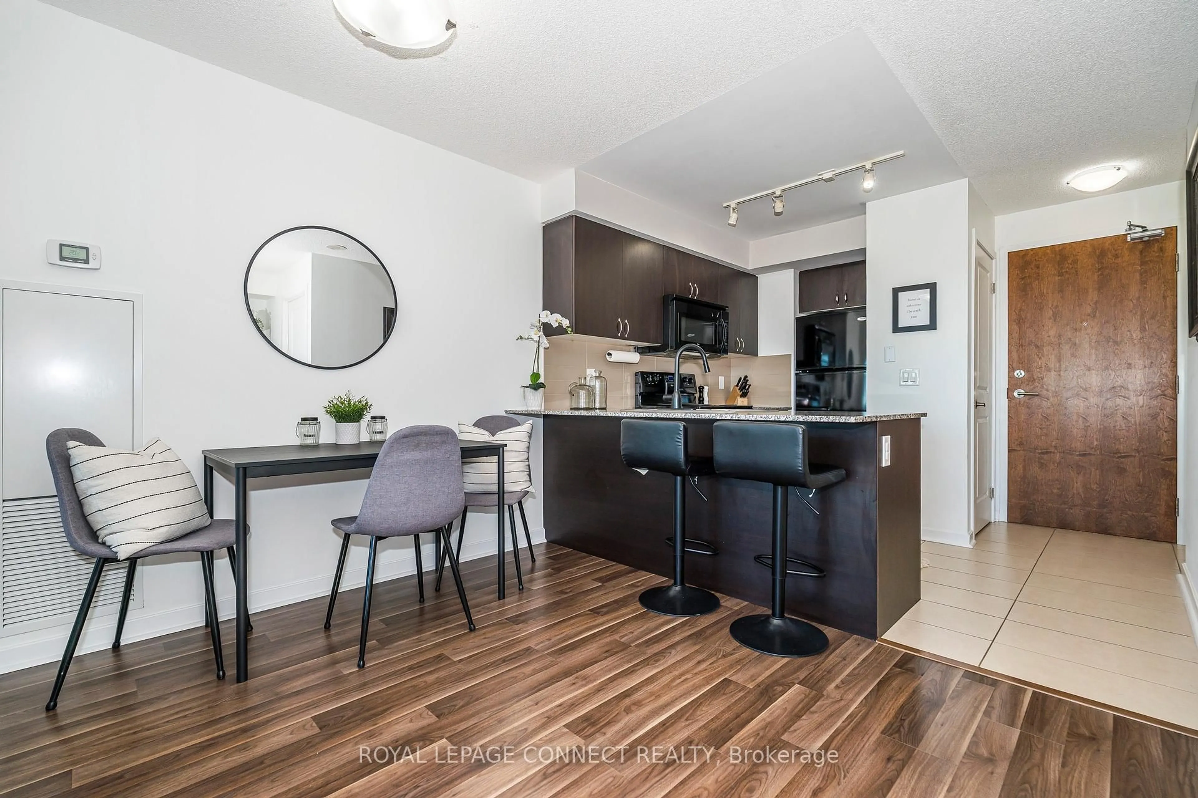 Open concept kitchen, wood/laminate floor for 1235 Bayly St #1204, Pickering Ontario L1W 1L7