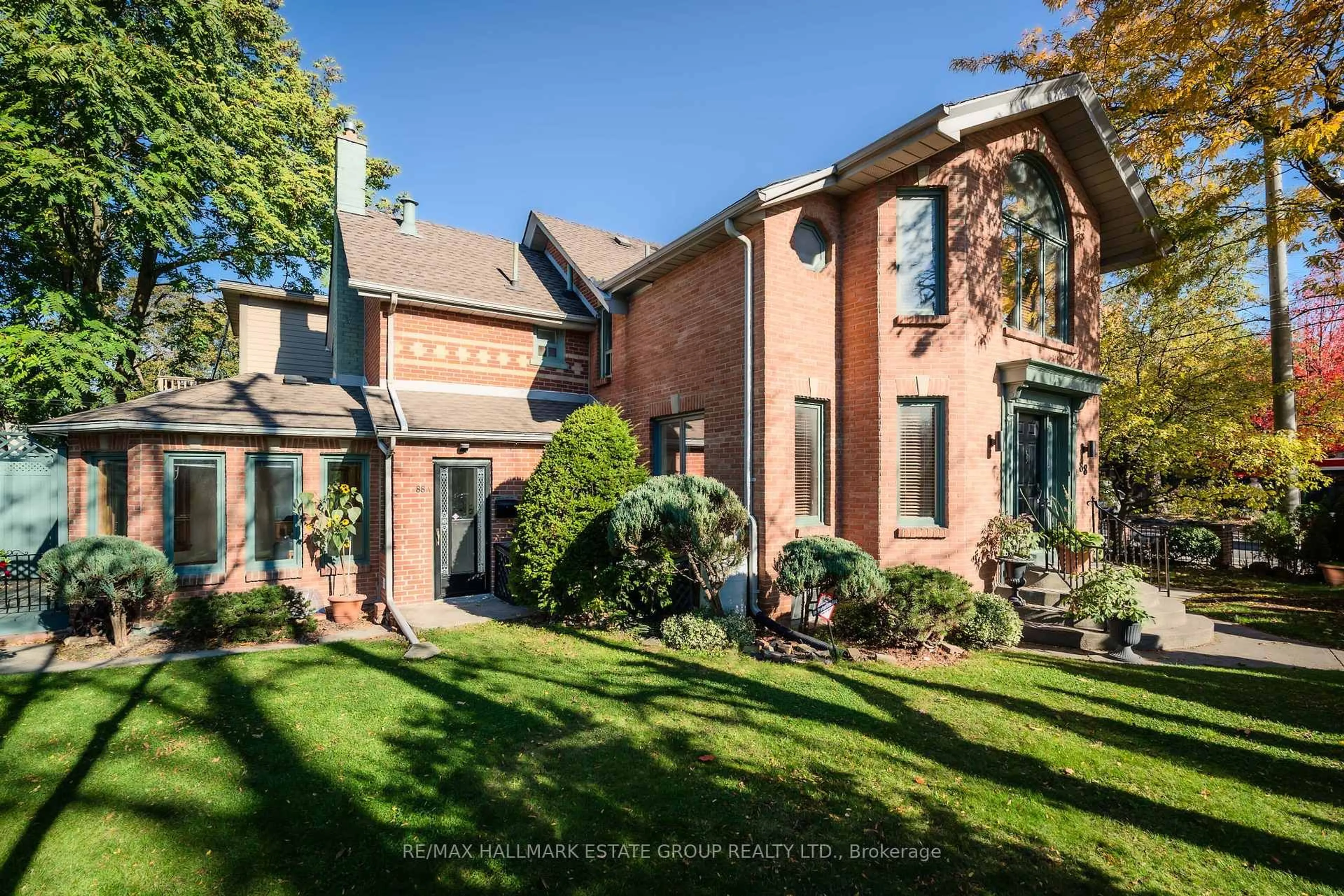 Home with brick exterior material, street for 88 Dawes Rd, Toronto Ontario M4C 5B4