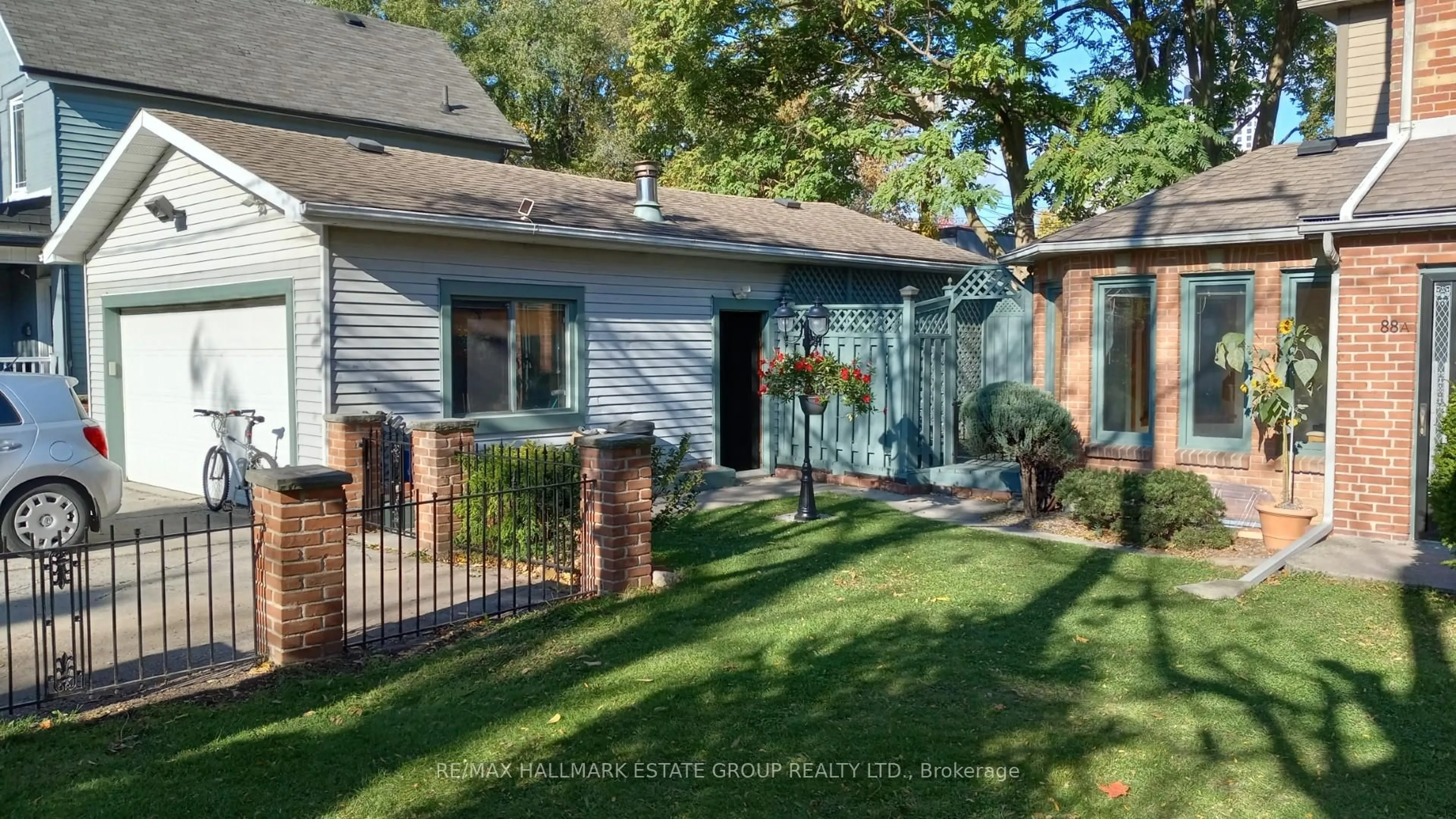 Home with brick exterior material, street for 88 Dawes Rd, Toronto Ontario M4C 5B4