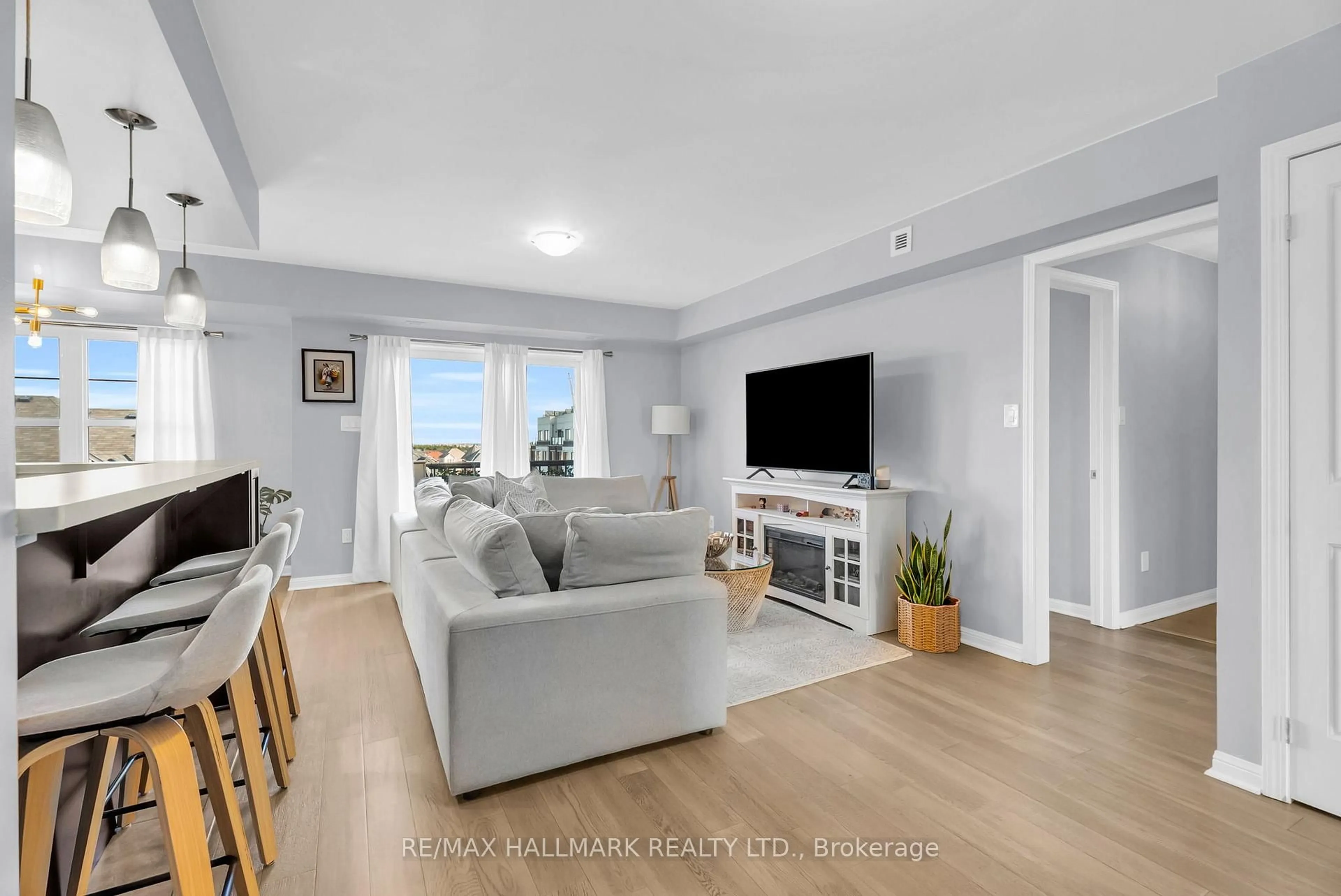 Living room with furniture, unknown for 1725 Pure Springs Blvd #307, Pickering Ontario L1X 0C4