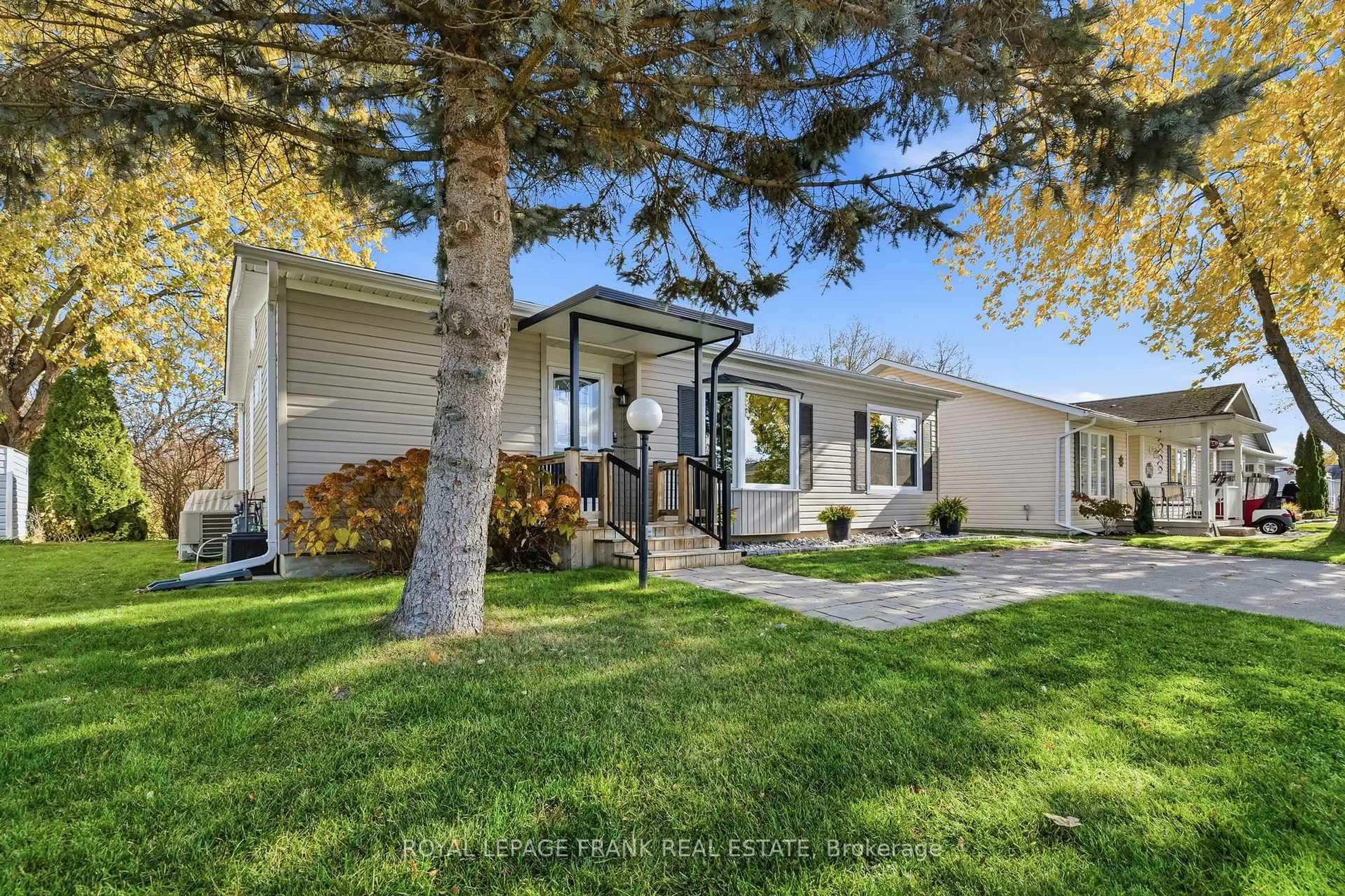 Home with vinyl exterior material, street for 37 Fairway Dr, Clarington Ontario L1B 1B4