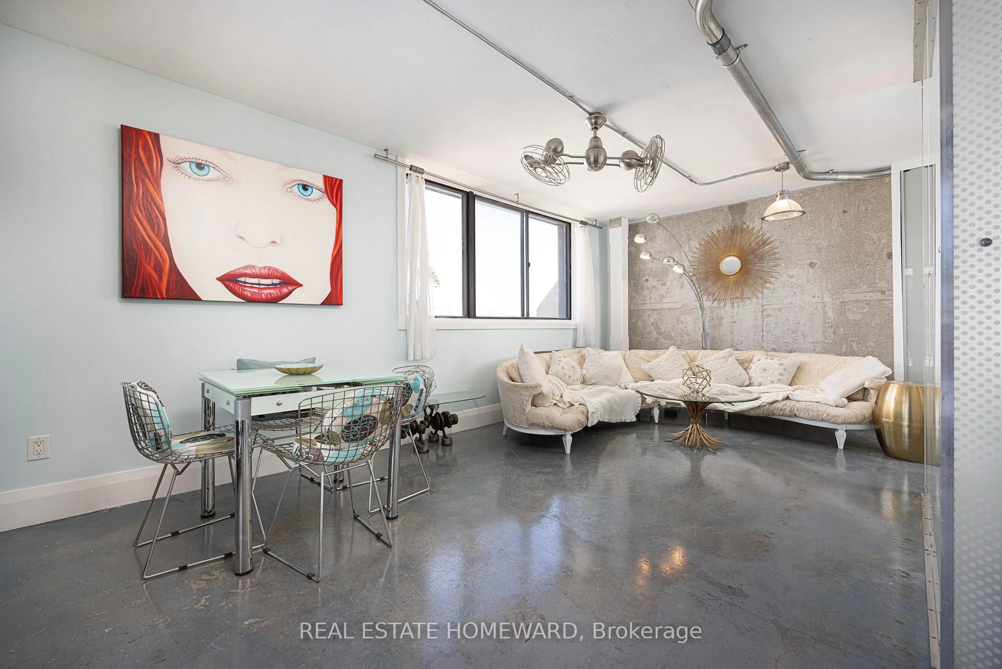 Living room with furniture, cement floor for 665 Kennedy Rd #702, Toronto Ontario M1K 5E2