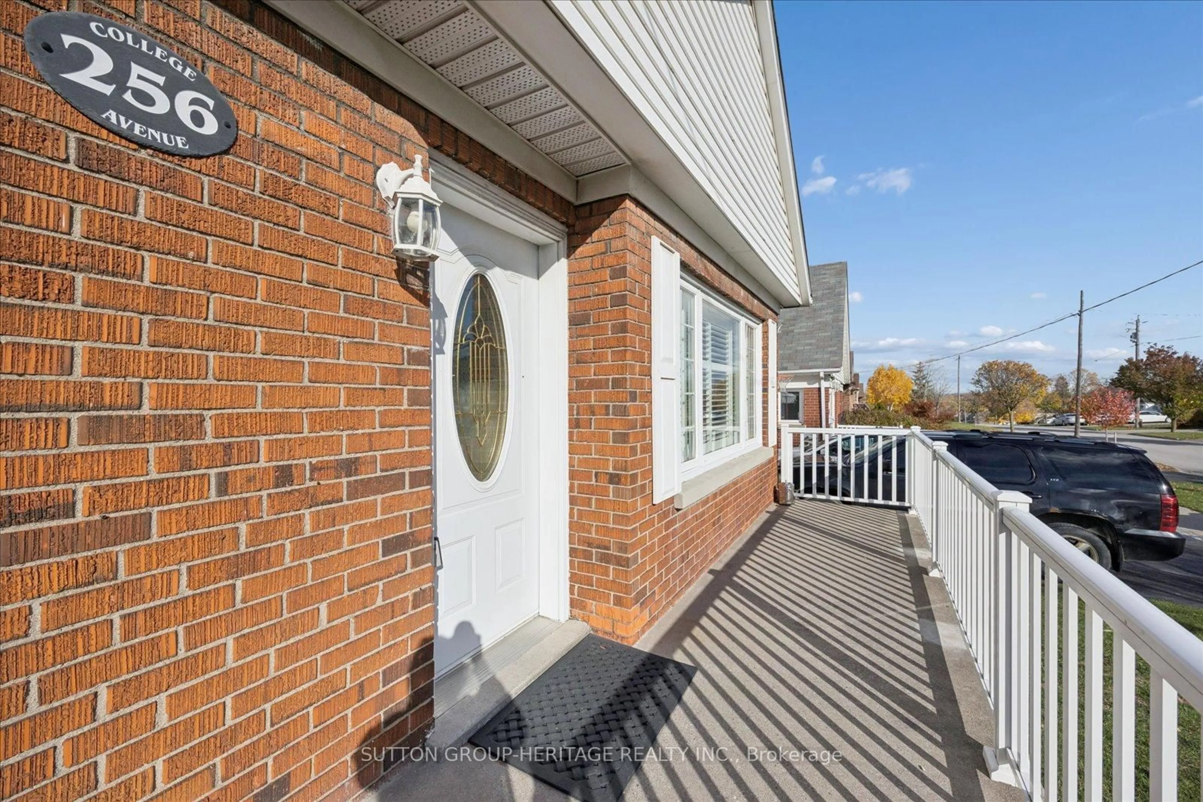 Home with brick exterior material, street for 256 College Ave, Oshawa Ontario L1J 1R7