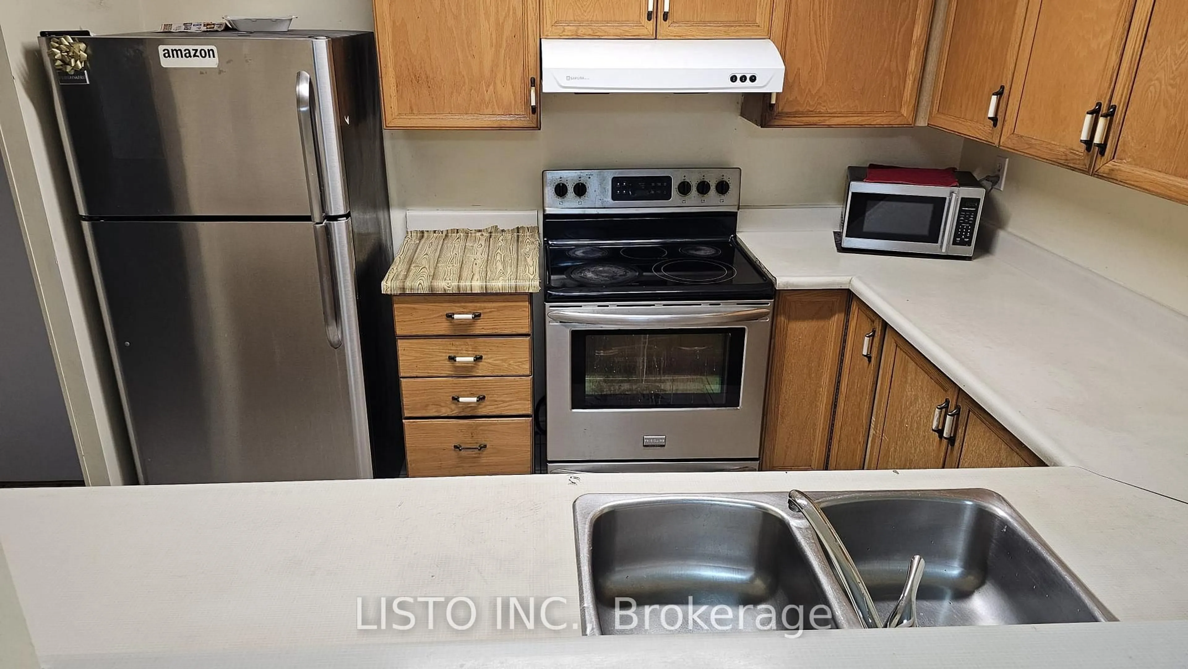Standard kitchen, unknown for 400 McLevin Ave #210, Toronto Ontario M1B 5J4