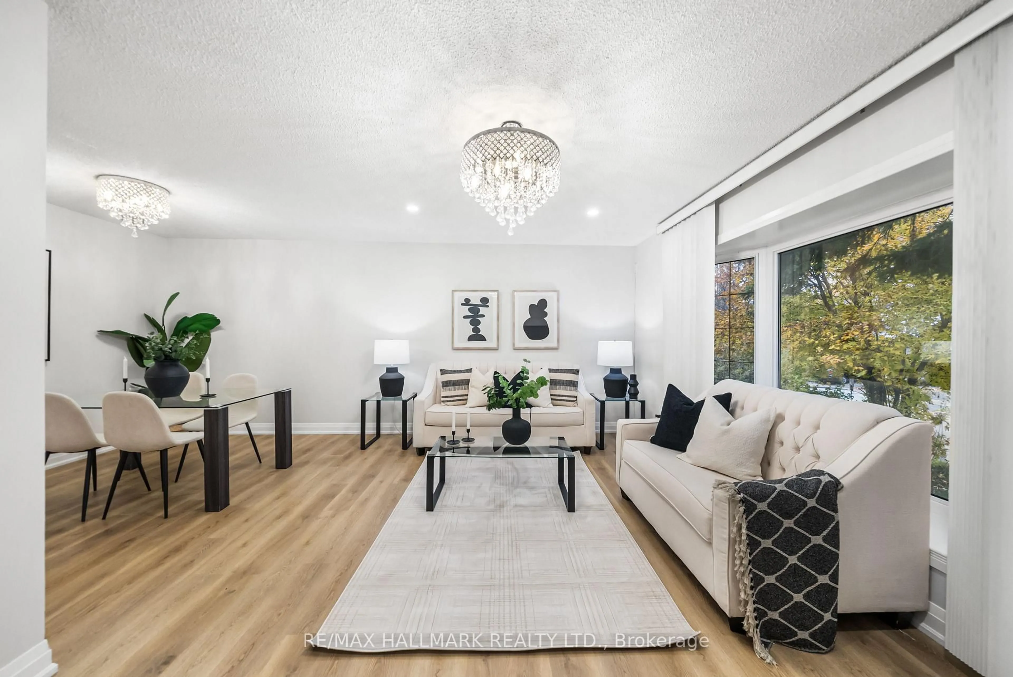 Living room with furniture, unknown for 17 Dunsfold Dr, Toronto Ontario M1B 1T5