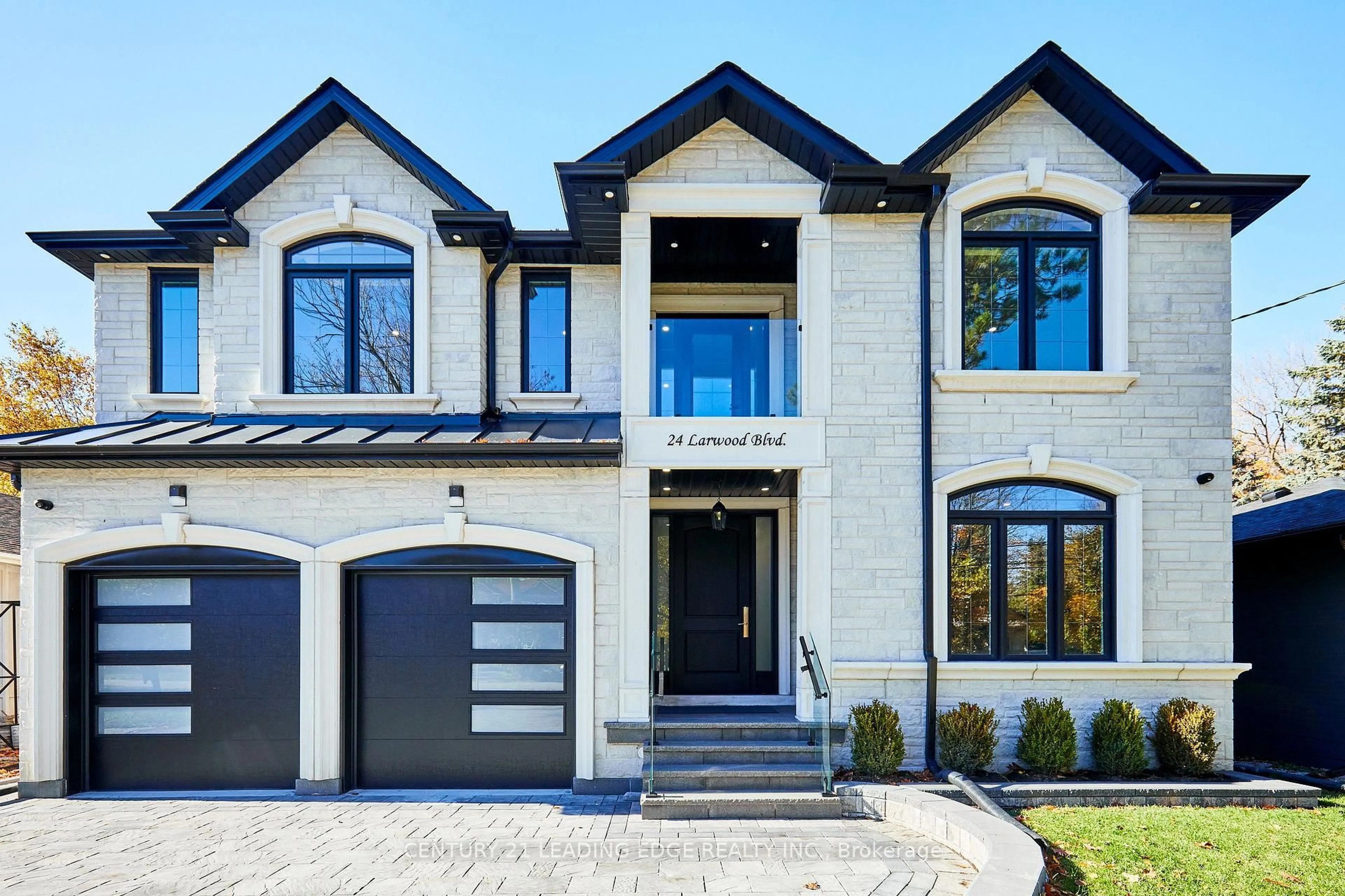 Home with brick exterior material, street for 24 Larwood Blvd, Toronto Ontario M1M 2M5