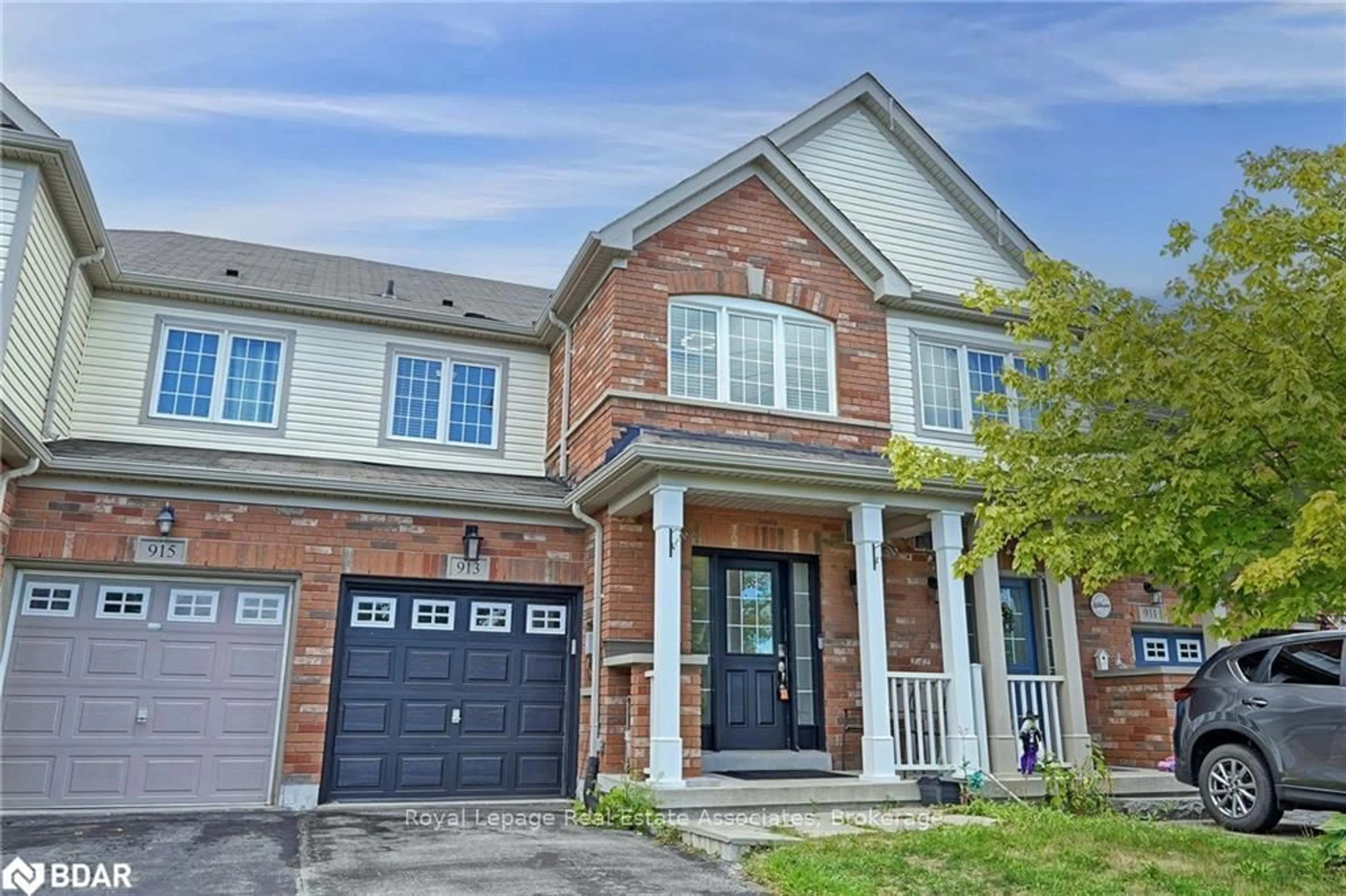 Home with brick exterior material, street for 913 Fetchison Dr, Oshawa Ontario L1K 0L3