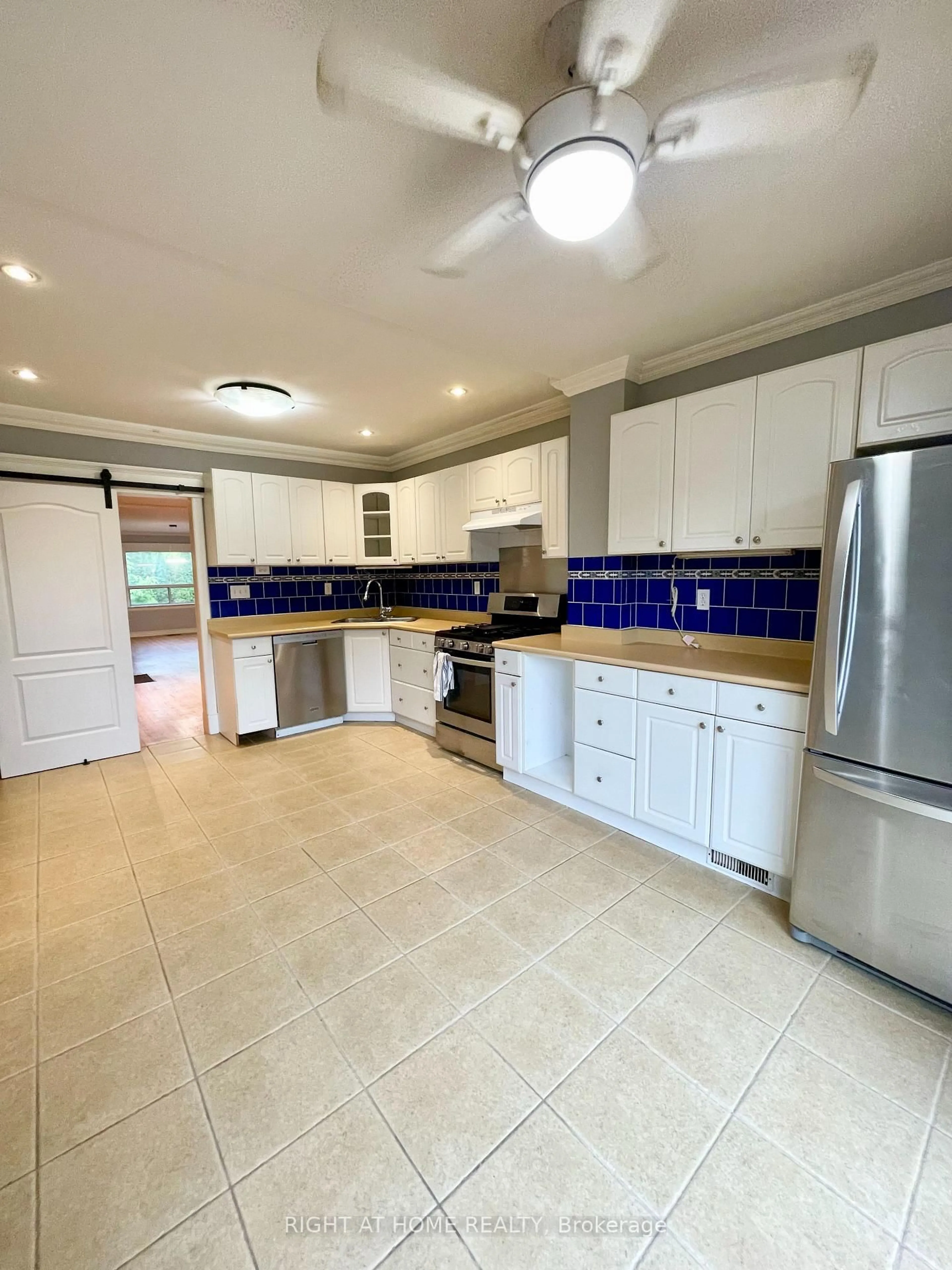Open concept kitchen, ceramic/tile floor for 34 Woodington Ave, Toronto Ontario M4C 3J3