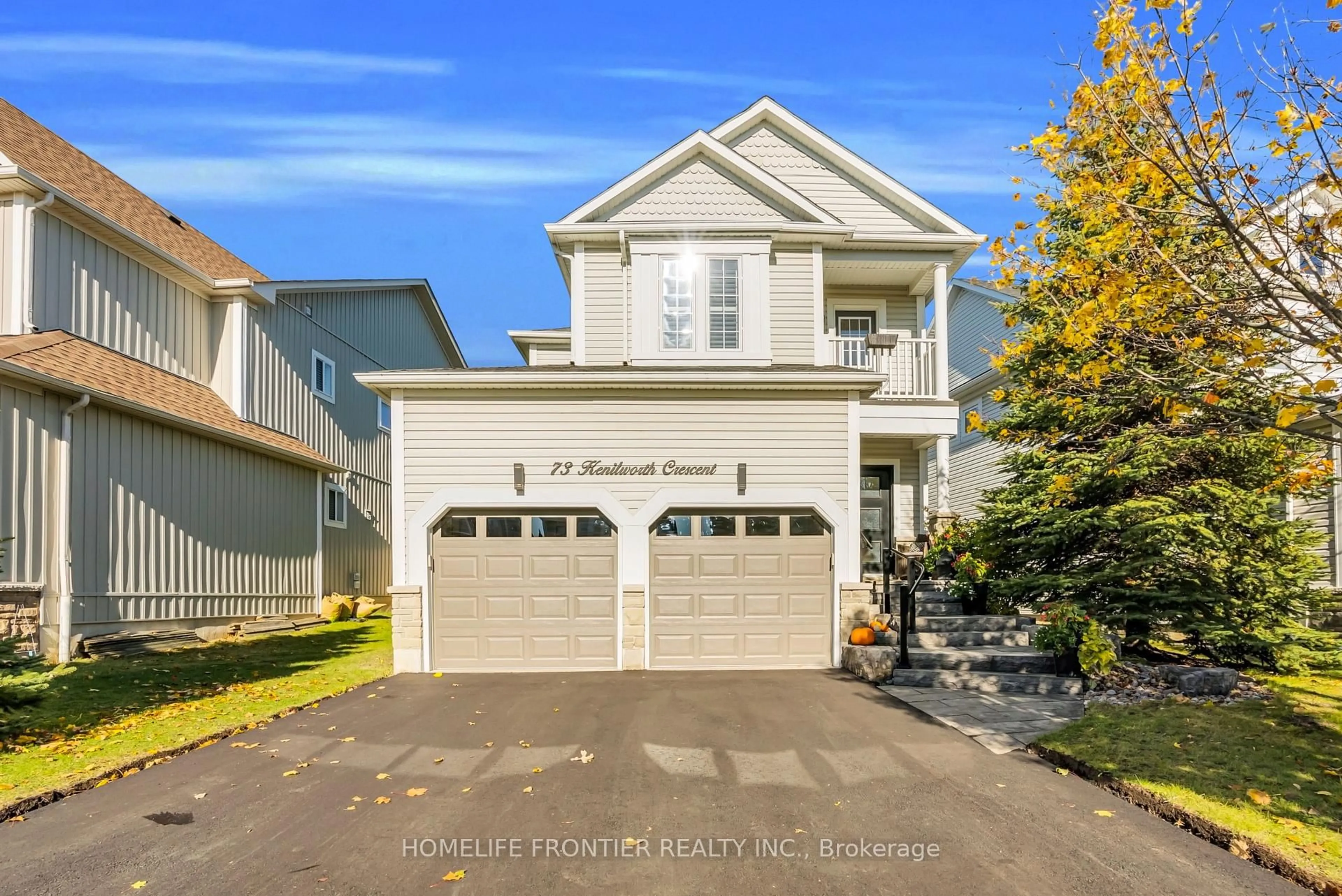 Home with vinyl exterior material, street for 73 Kenilworth Cres, Whitby Ontario L1M 2M7