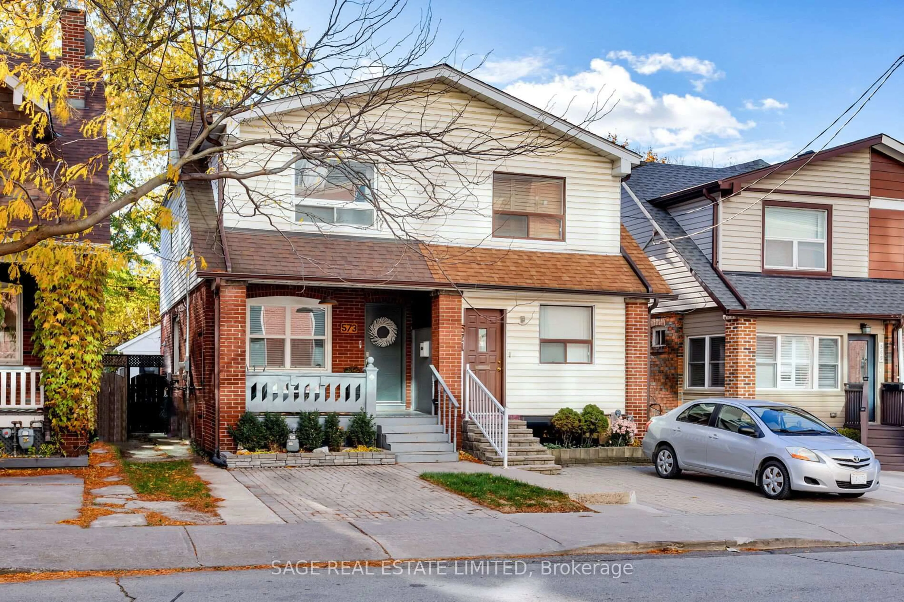 Home with brick exterior material, street for 573 Sammon Ave, Toronto Ontario M4C 2E1