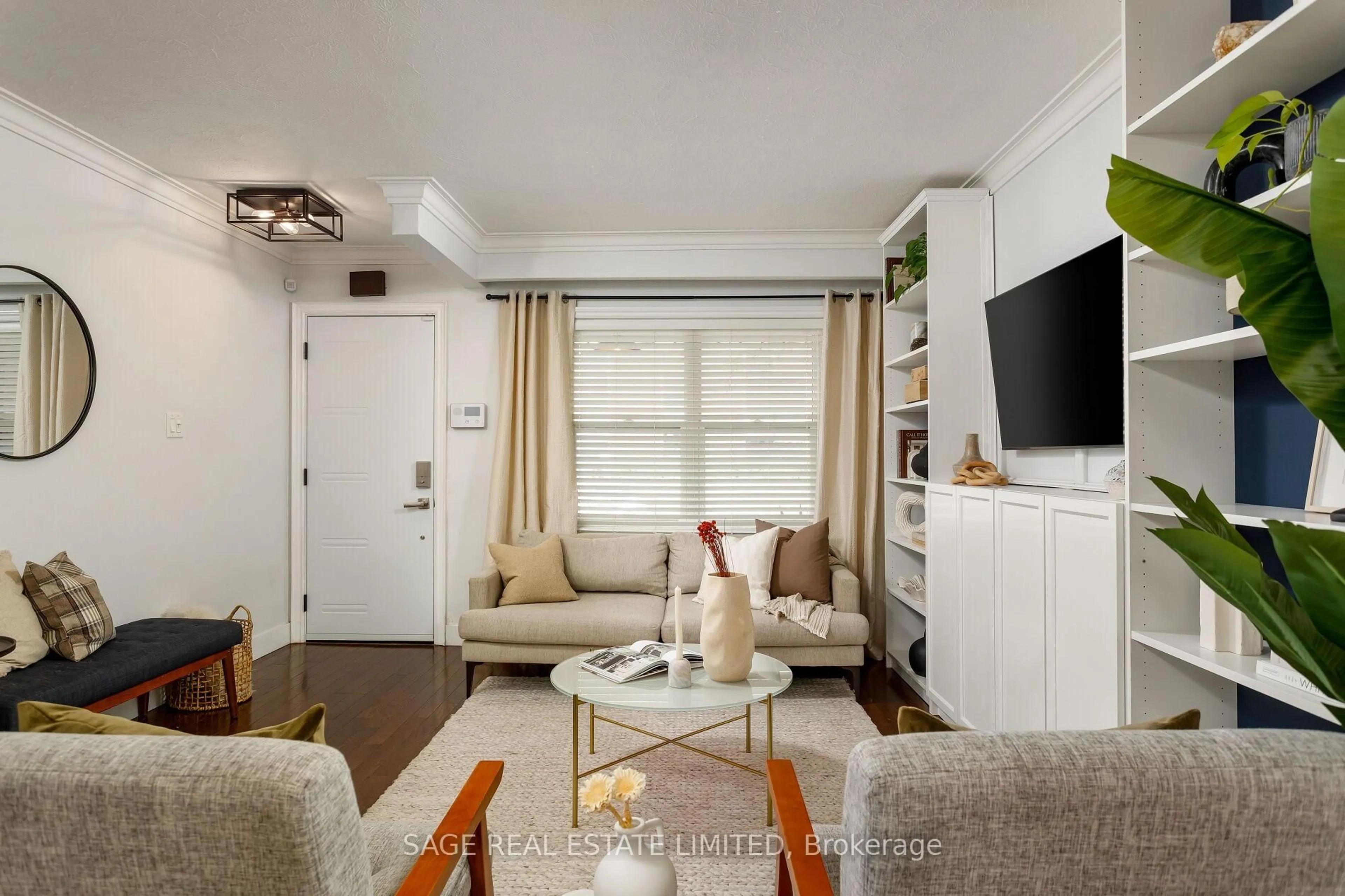 Living room with furniture, unknown for 573 Sammon Ave, Toronto Ontario M4C 2E1